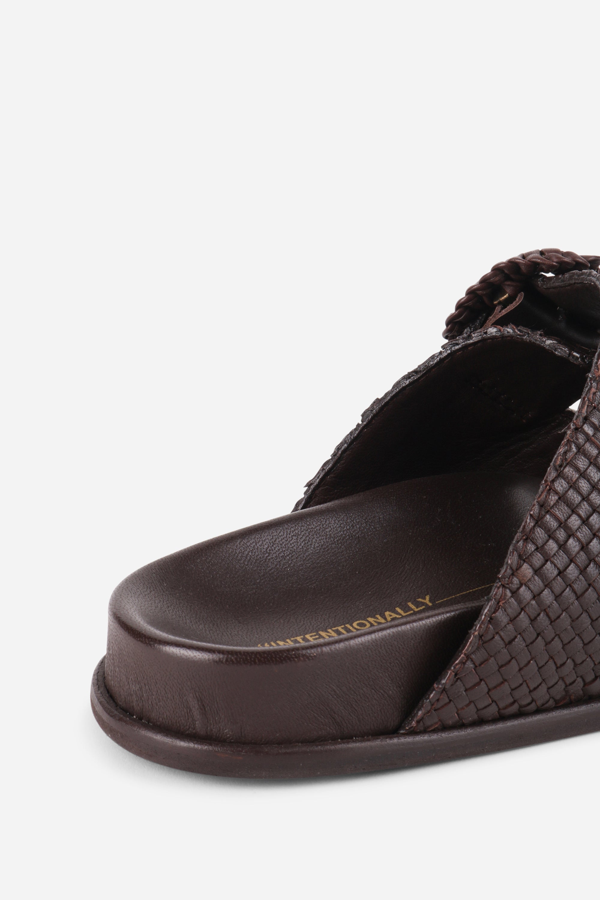 "INTENTIONALLY __________." Milano Sandal