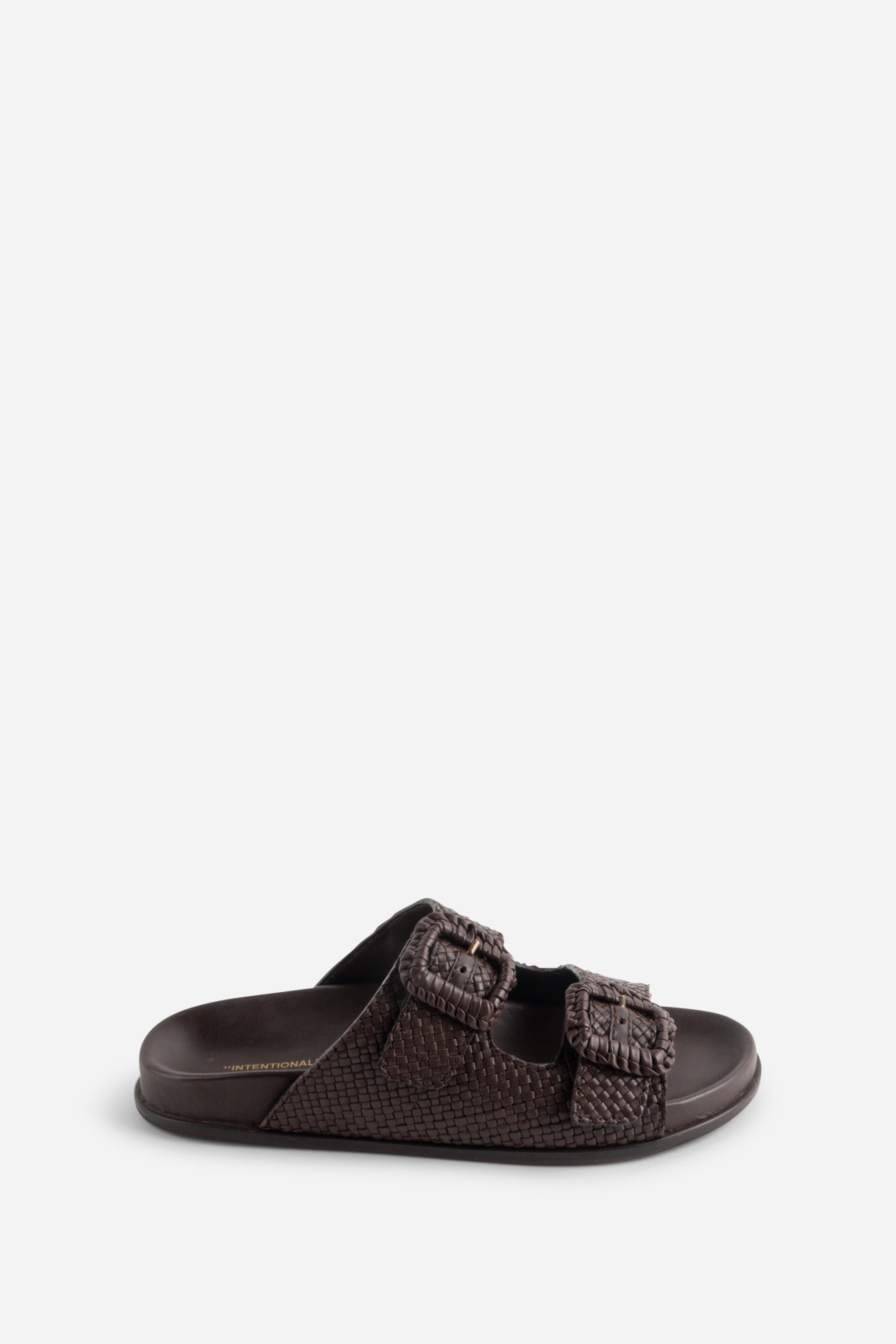 "INTENTIONALLY __________." Milano Sandal