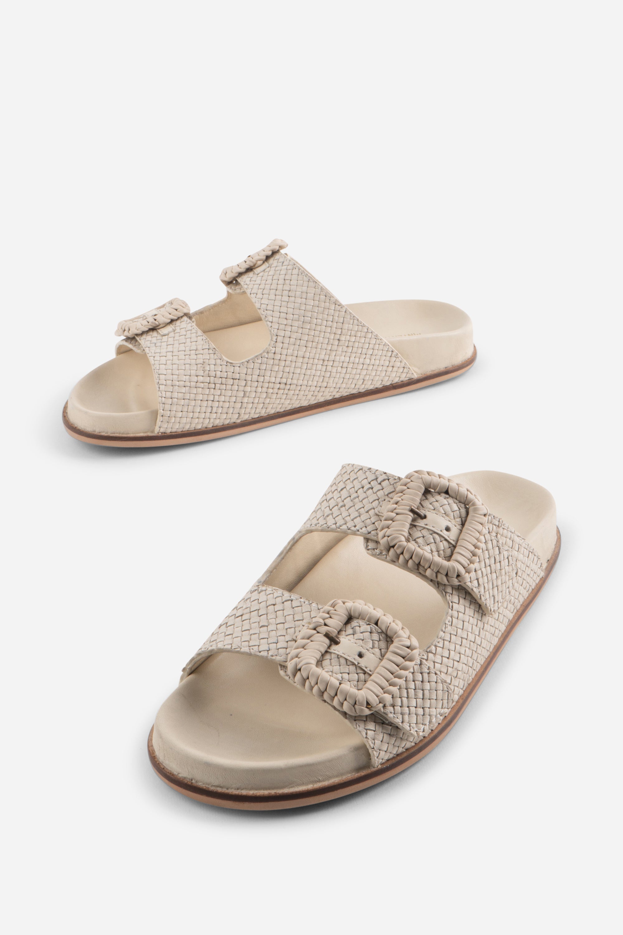 "INTENTIONALLY __________." Milano Sandal