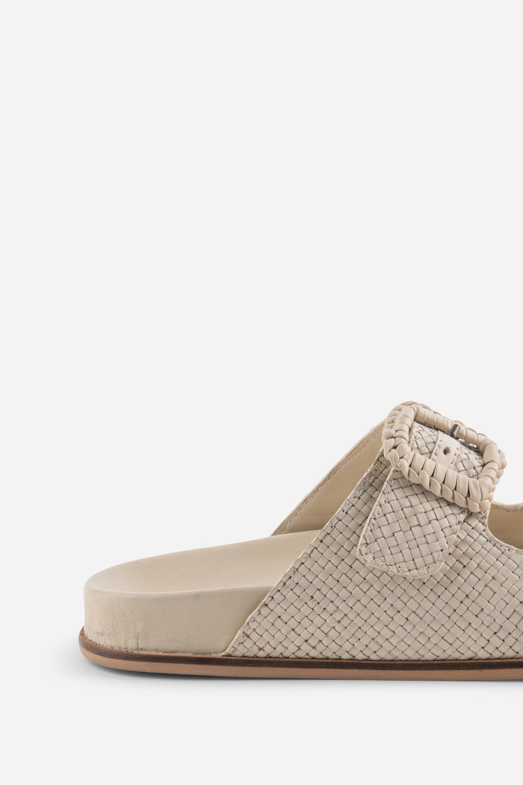 "INTENTIONALLY __________." Milano Sandal