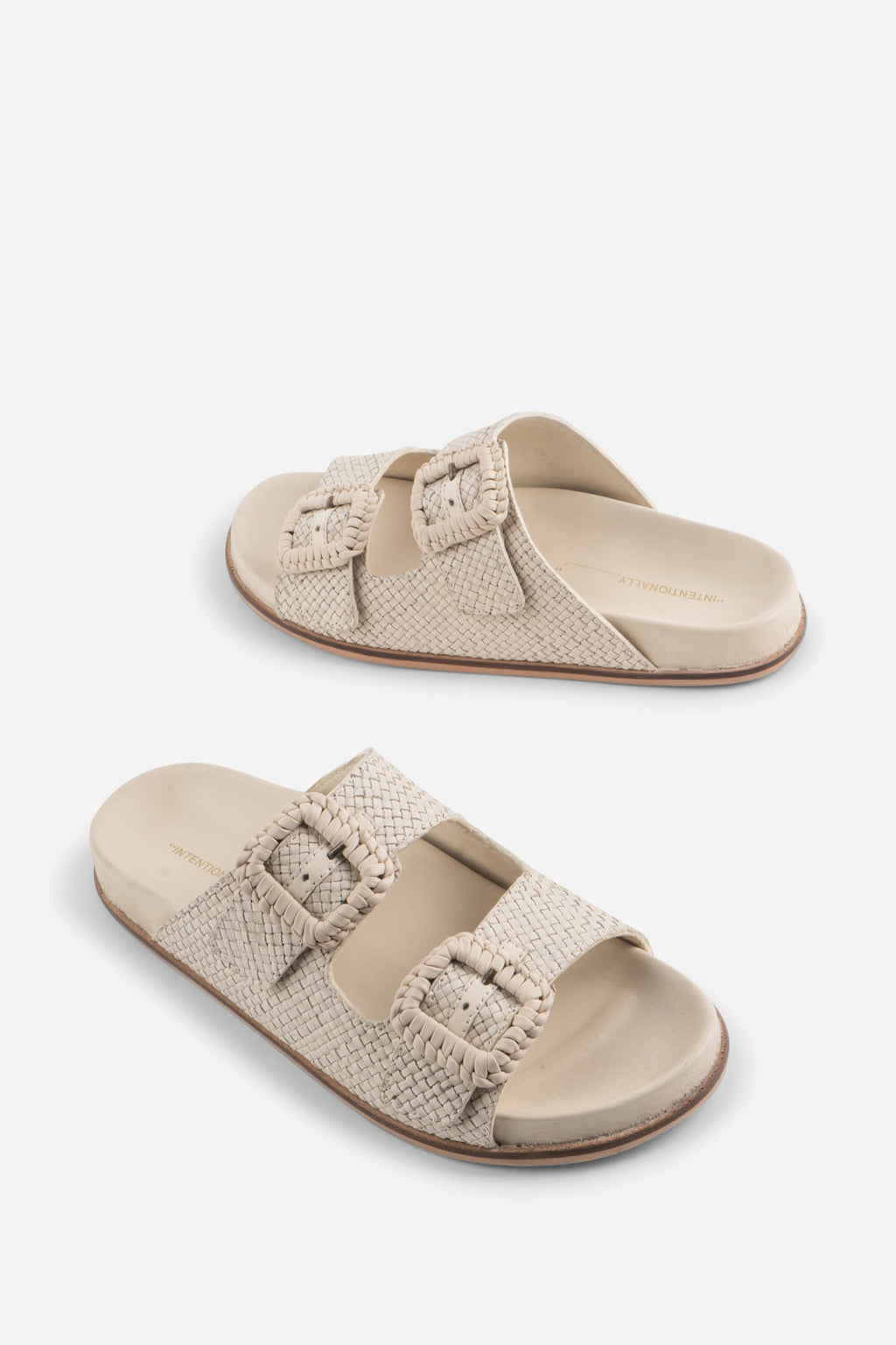"INTENTIONALLY __________." Milano Sandal
