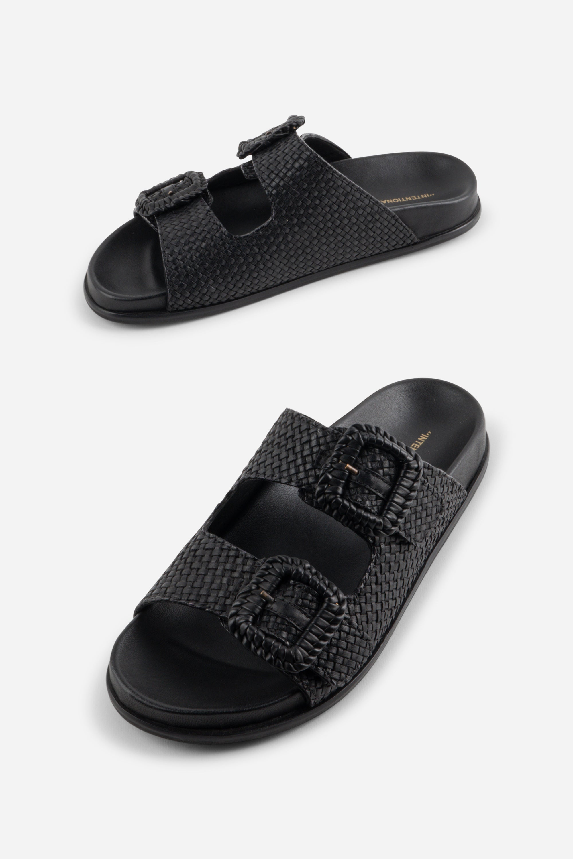 "INTENTIONALLY __________." Milano Sandal