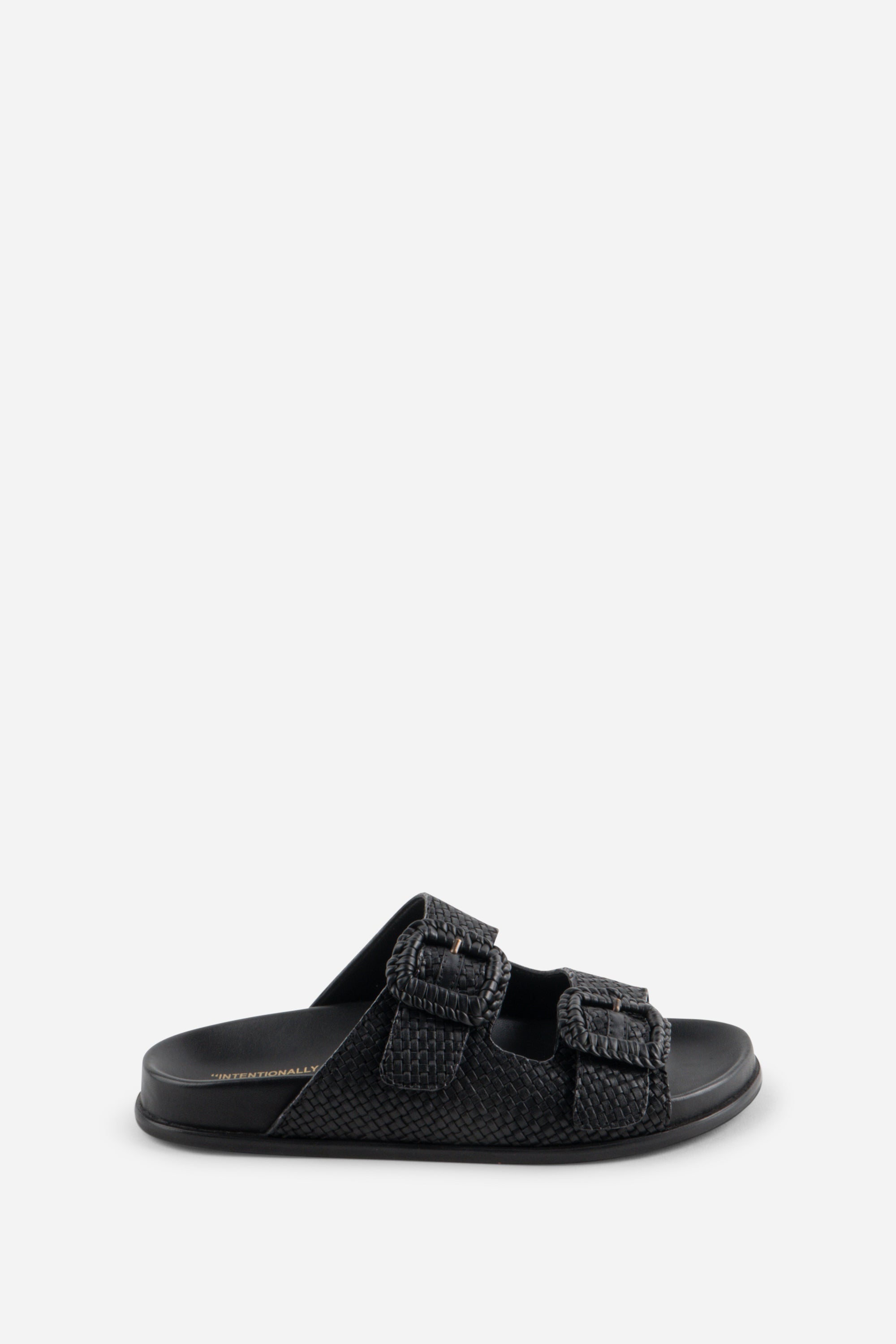"INTENTIONALLY __________." Milano Sandal