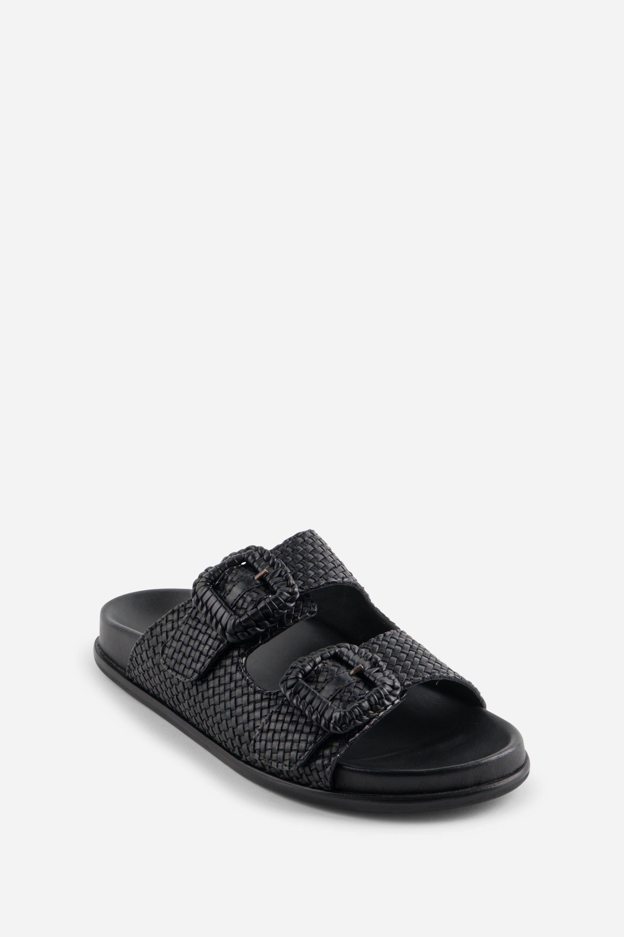 "INTENTIONALLY __________." Milano Sandal