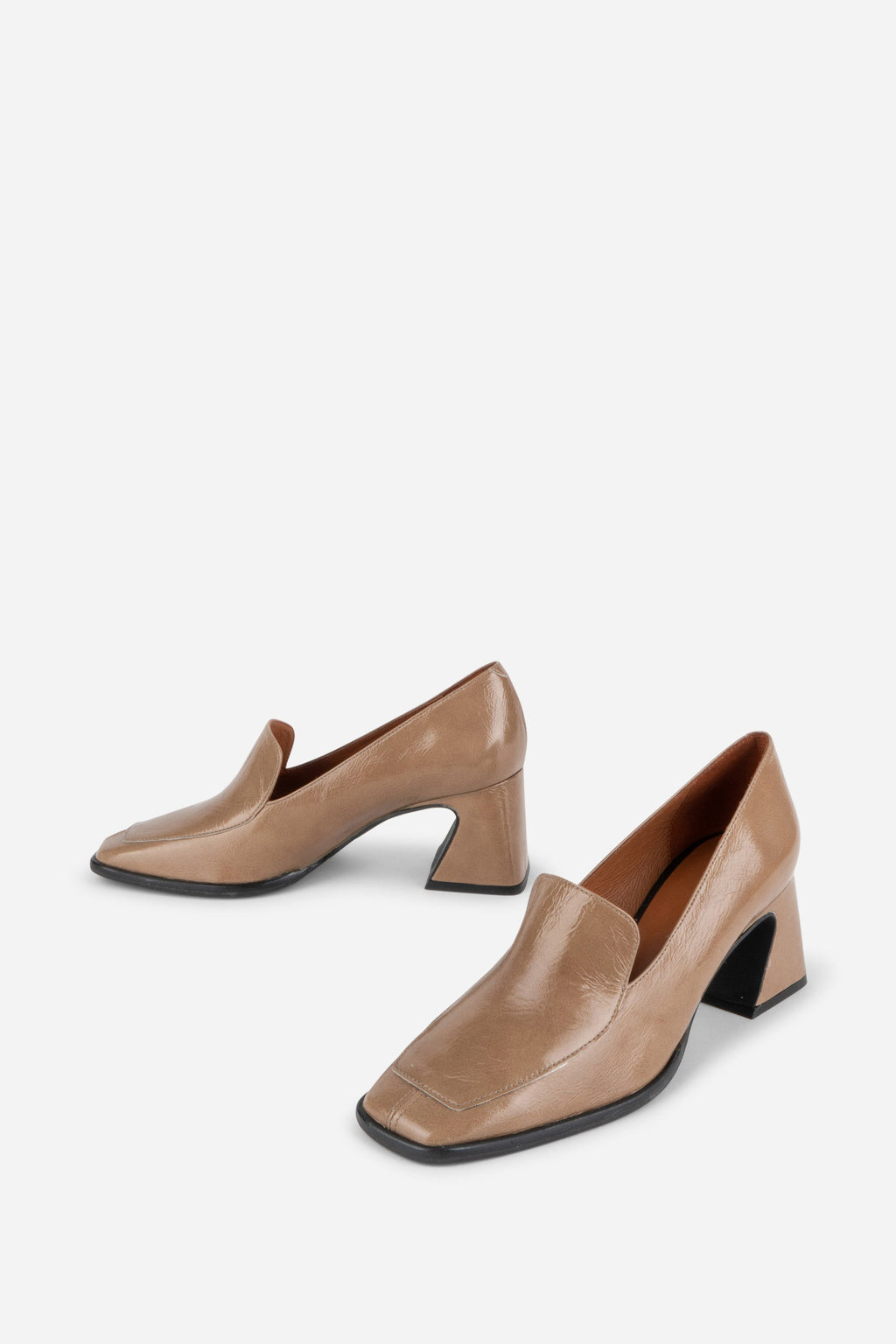 INTENTIONALLY __________. Mosa Heeled Loafer