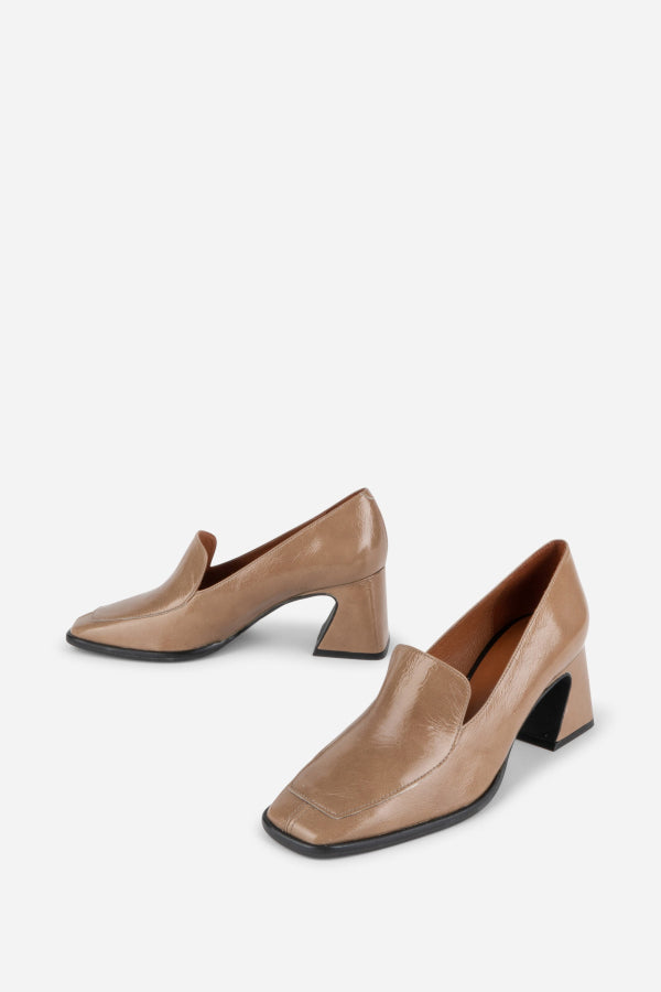 INTENTIONALLY __________. Mosa Heeled Loafer