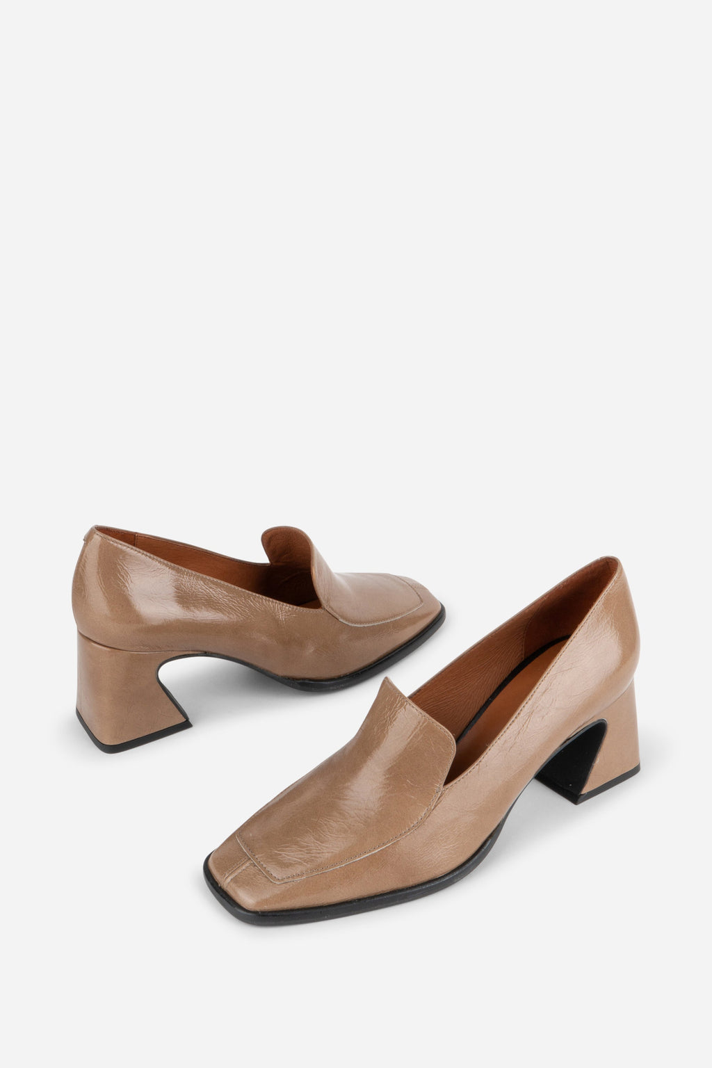 INTENTIONALLY __________. Mosa Heeled Loafer
