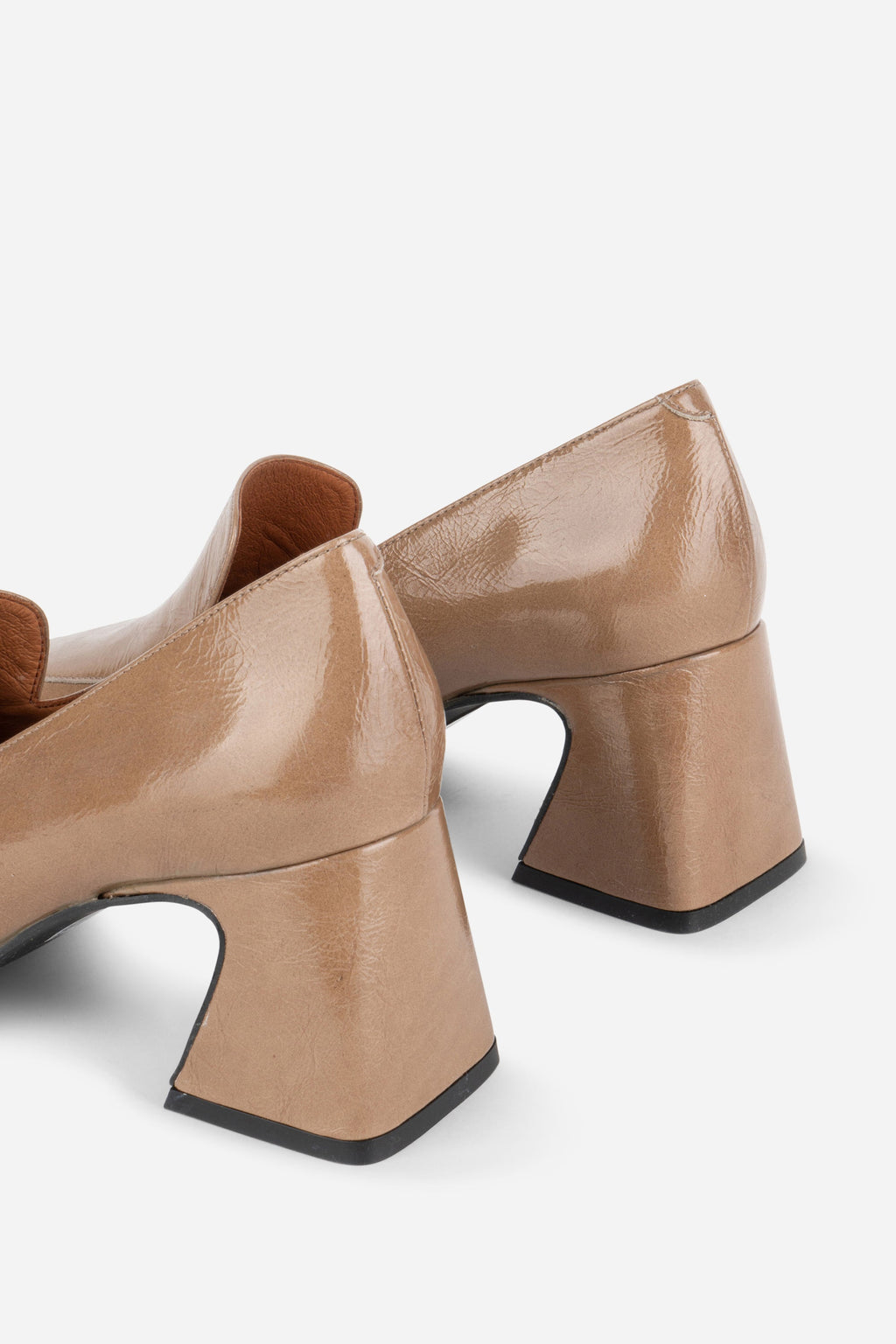 INTENTIONALLY __________. Mosa Heeled Loafer