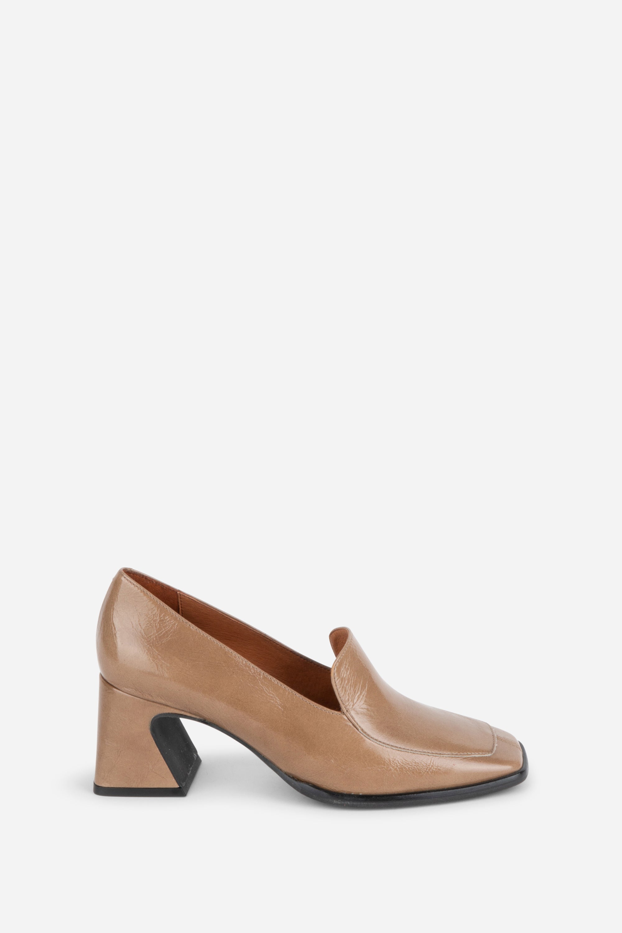 INTENTIONALLY __________. Mosa Heeled Loafer