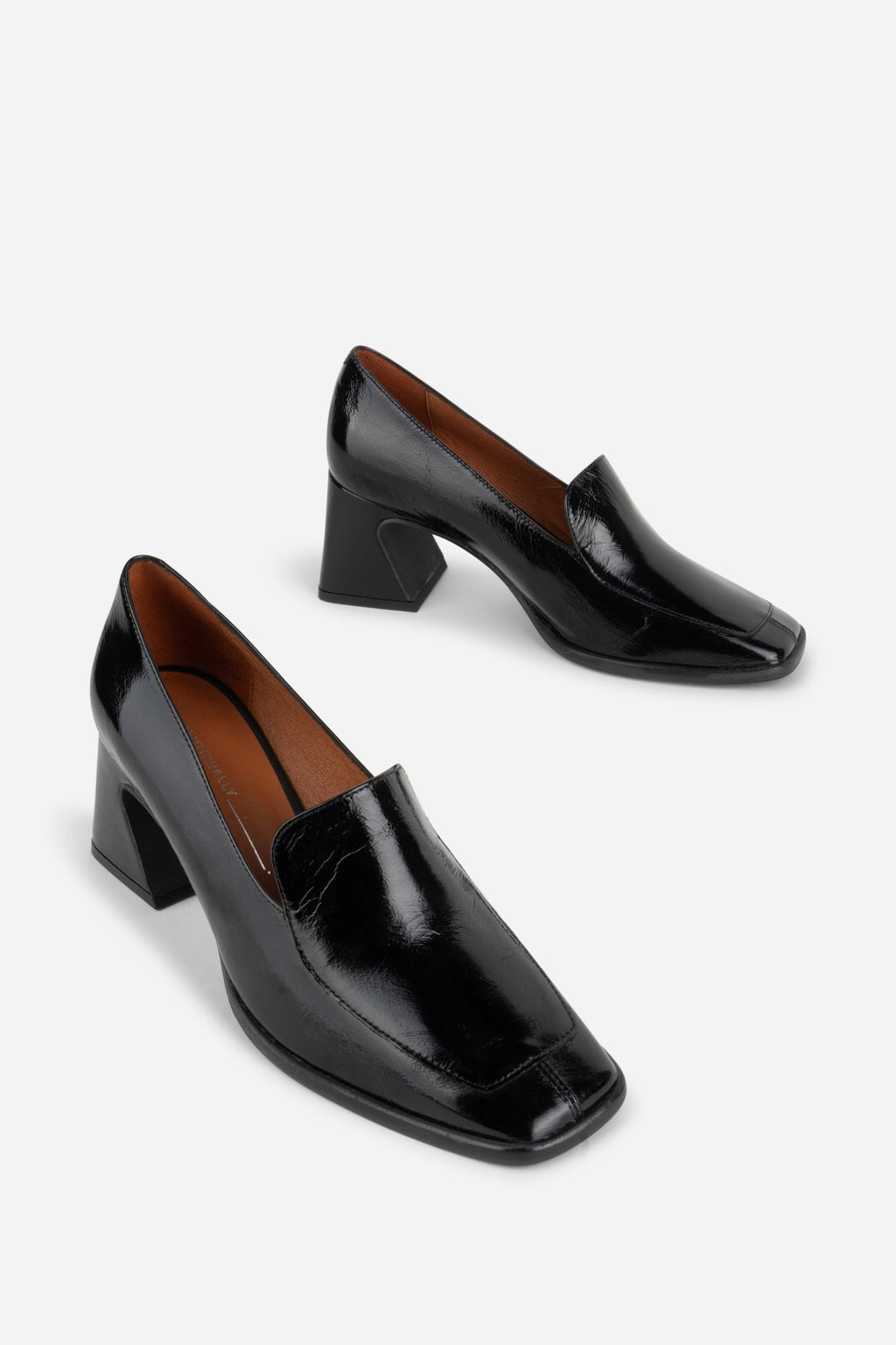 INTENTIONALLY __________. Mosa Heeled Loafer
