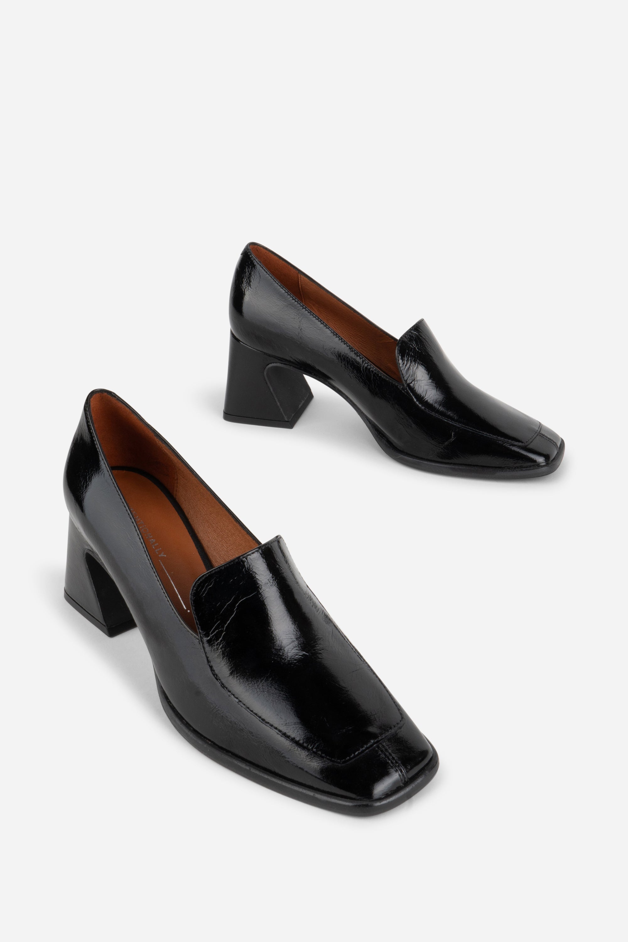 INTENTIONALLY __________. Mosa Heeled Loafer