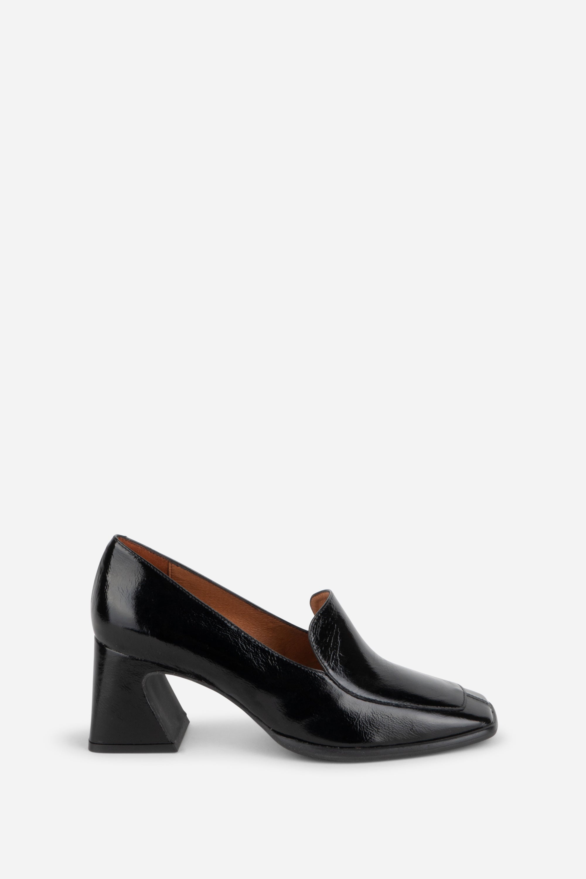 INTENTIONALLY __________. Mosa Heeled Loafer