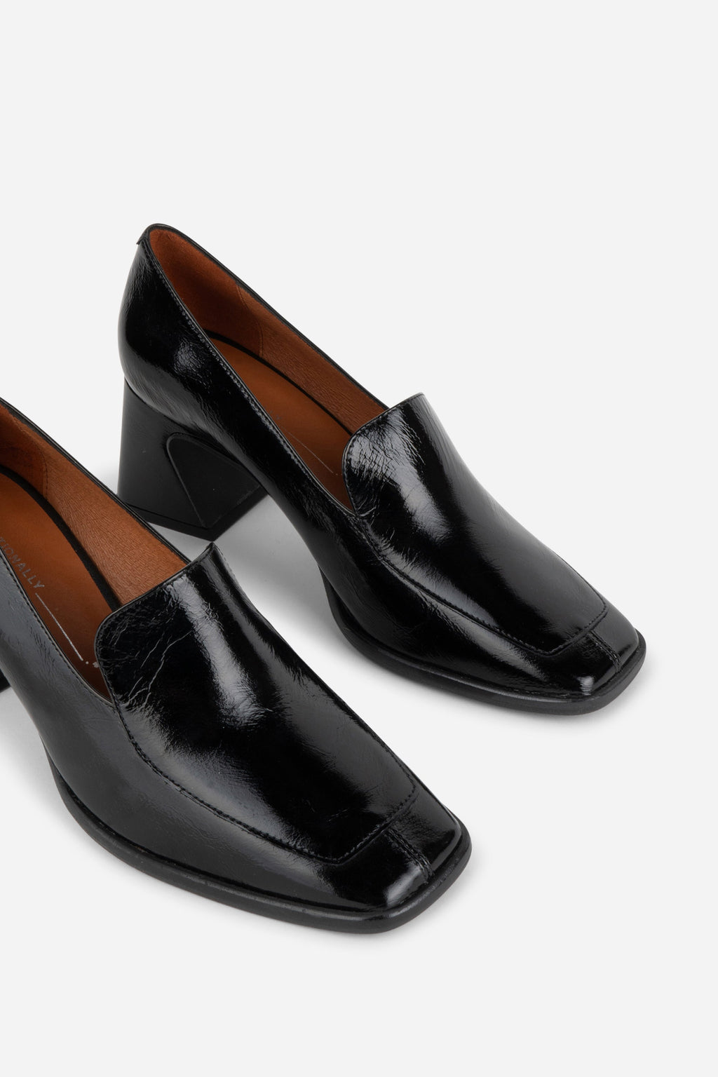 INTENTIONALLY __________. Mosa Heeled Loafer