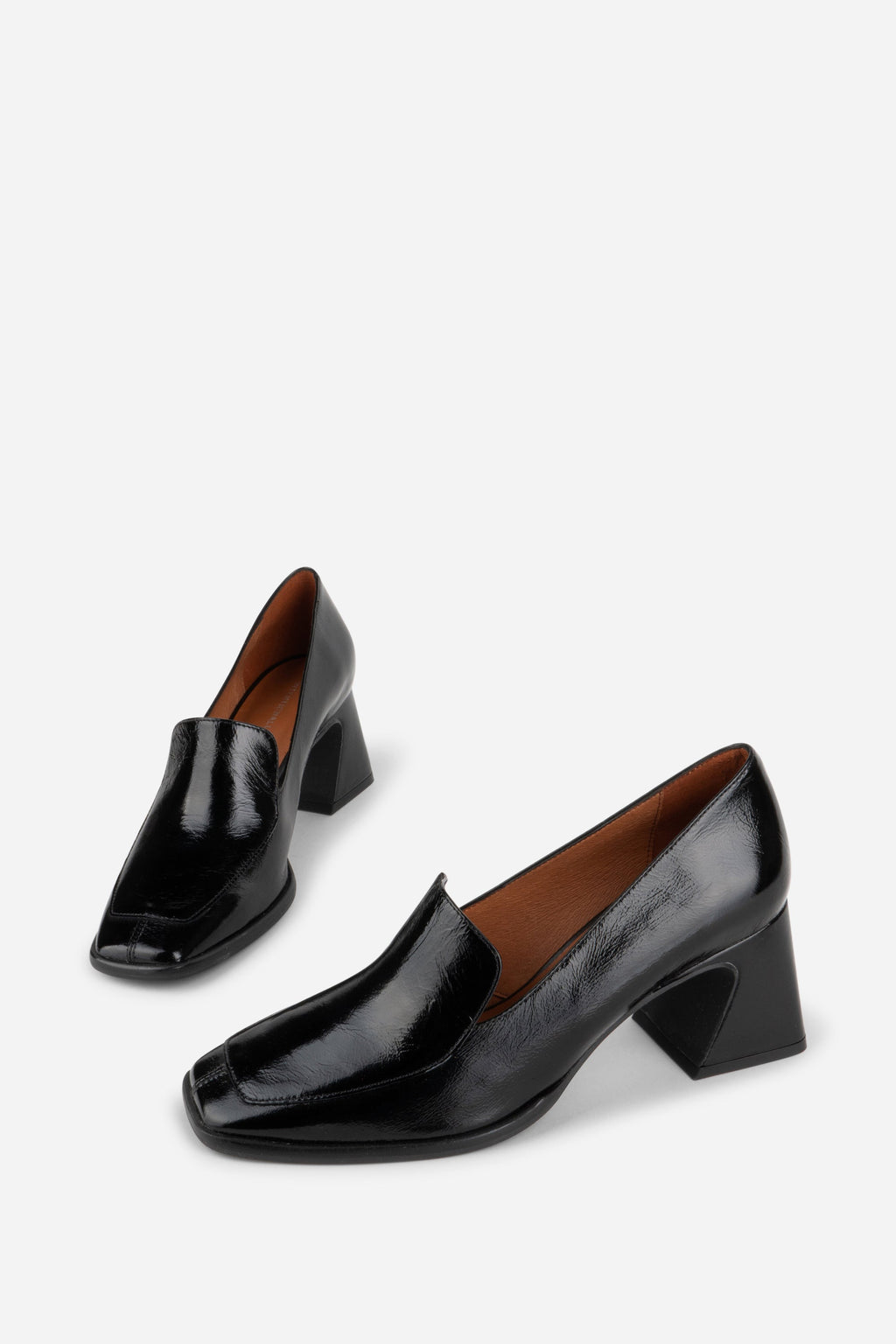 INTENTIONALLY __________. Mosa Heeled Loafer