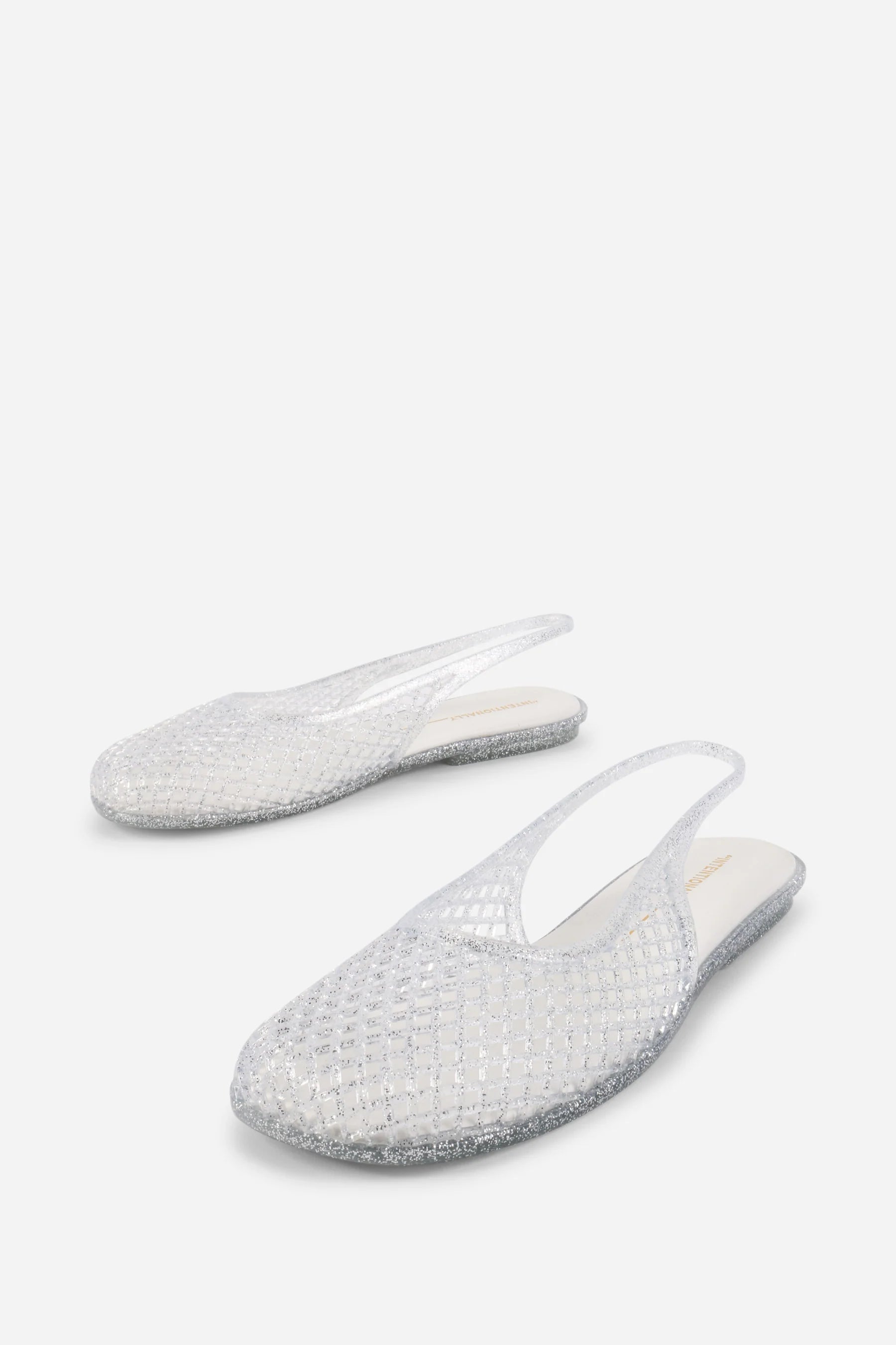 INTENTIONALLY __________. Nessa Jelly Slingback Ballet Flat