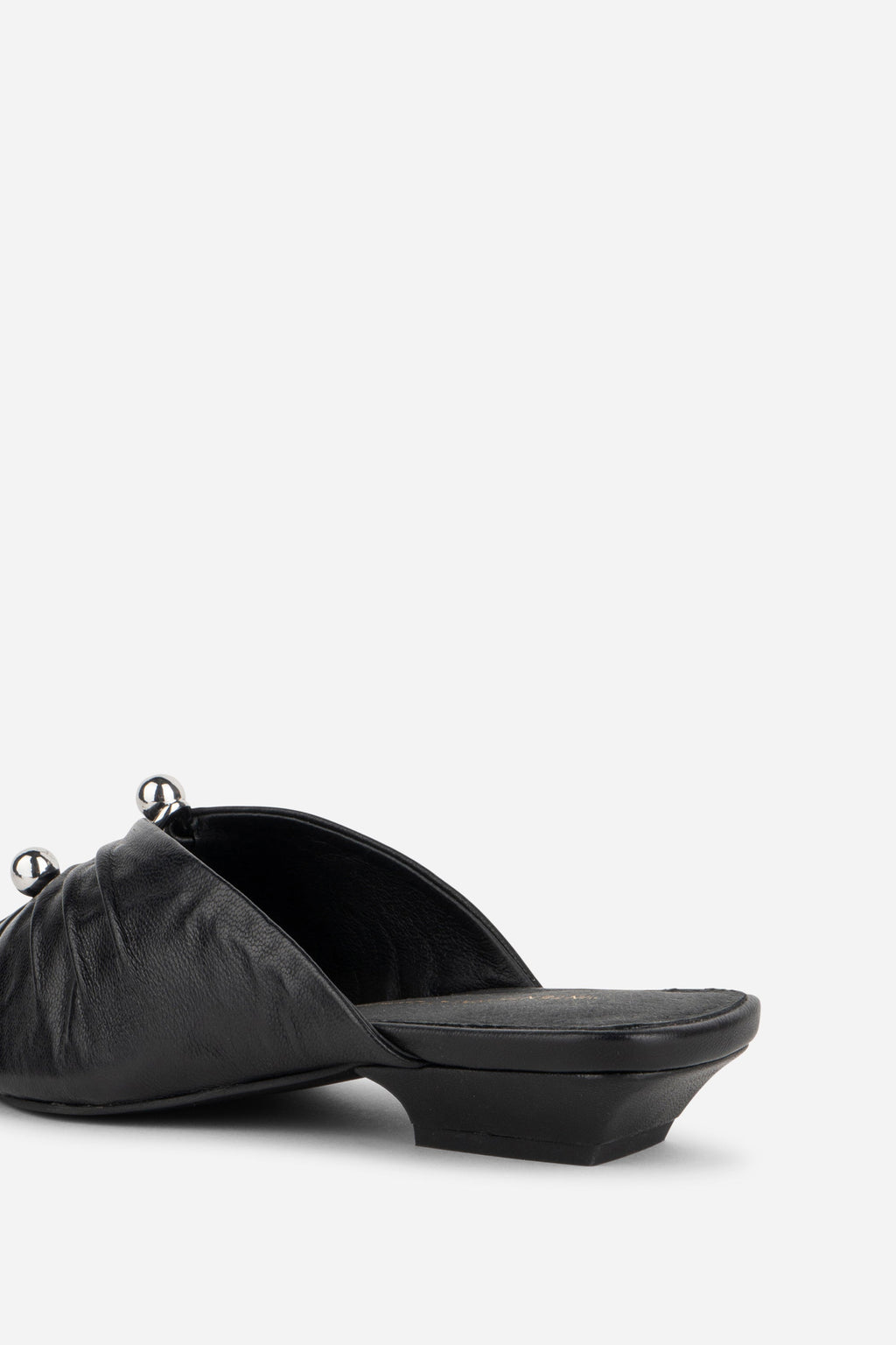 "INTENTIONALLY __________." Noah Pierced Mule