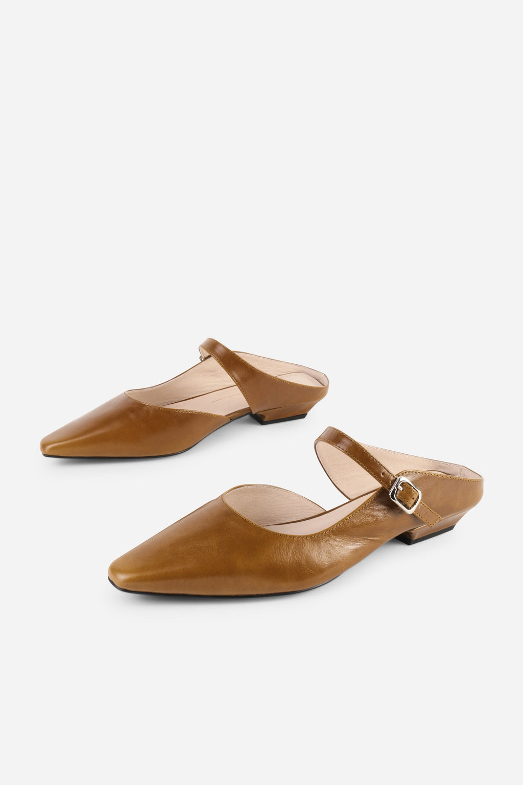INTENTIONALLY __________. Nona Leather Flat Mule