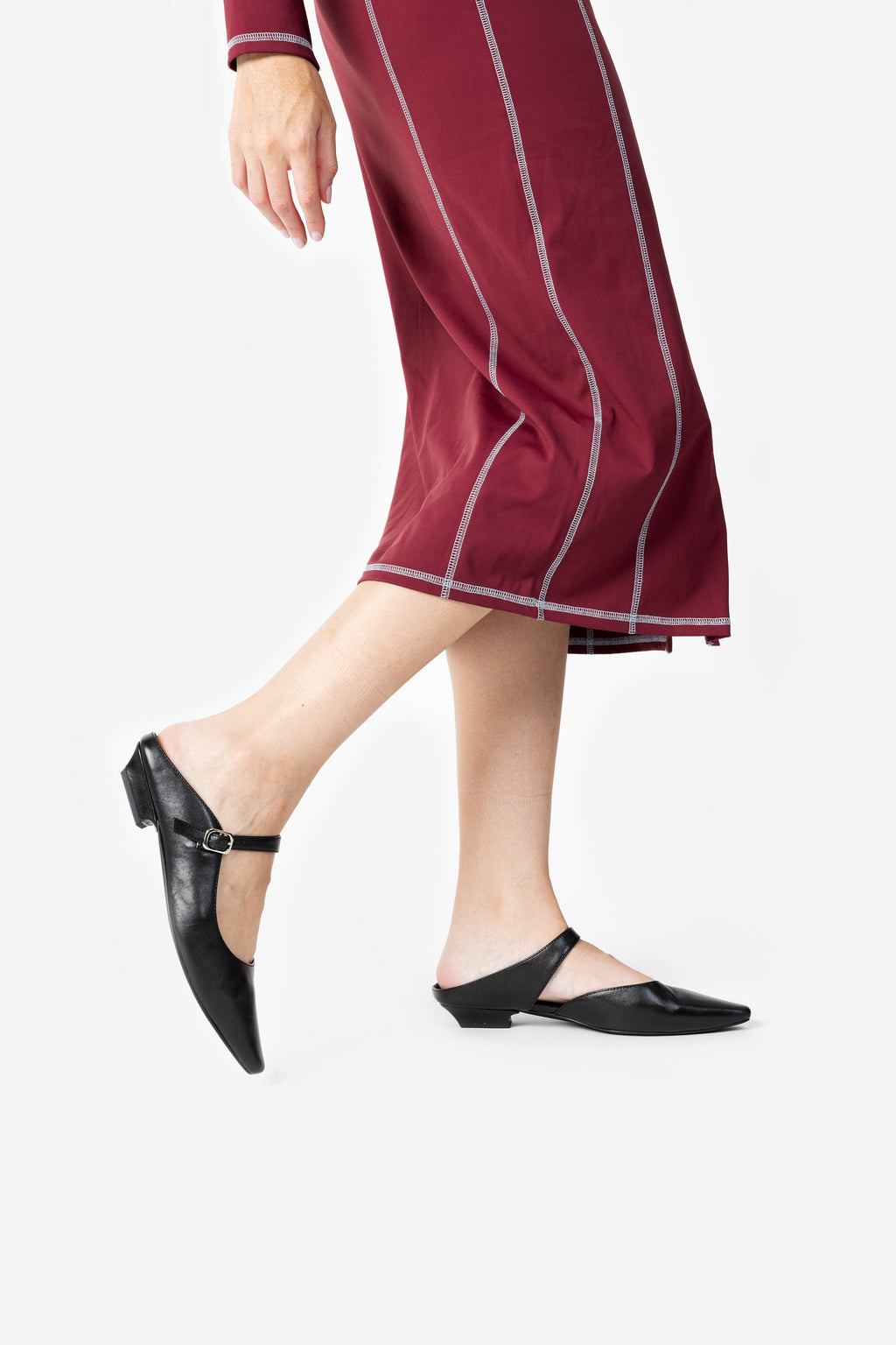 INTENTIONALLY __________. Nona Leather Flat Mule