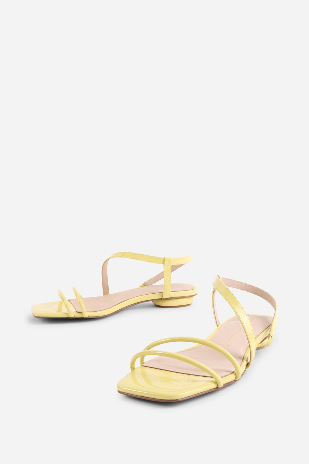 INTENTIONALLY __________. Nonfiction Flat Sandal