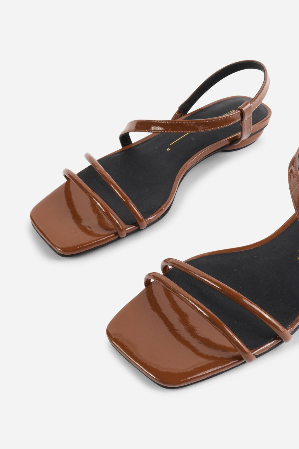 INTENTIONALLY __________. Nonfiction Flat Sandal