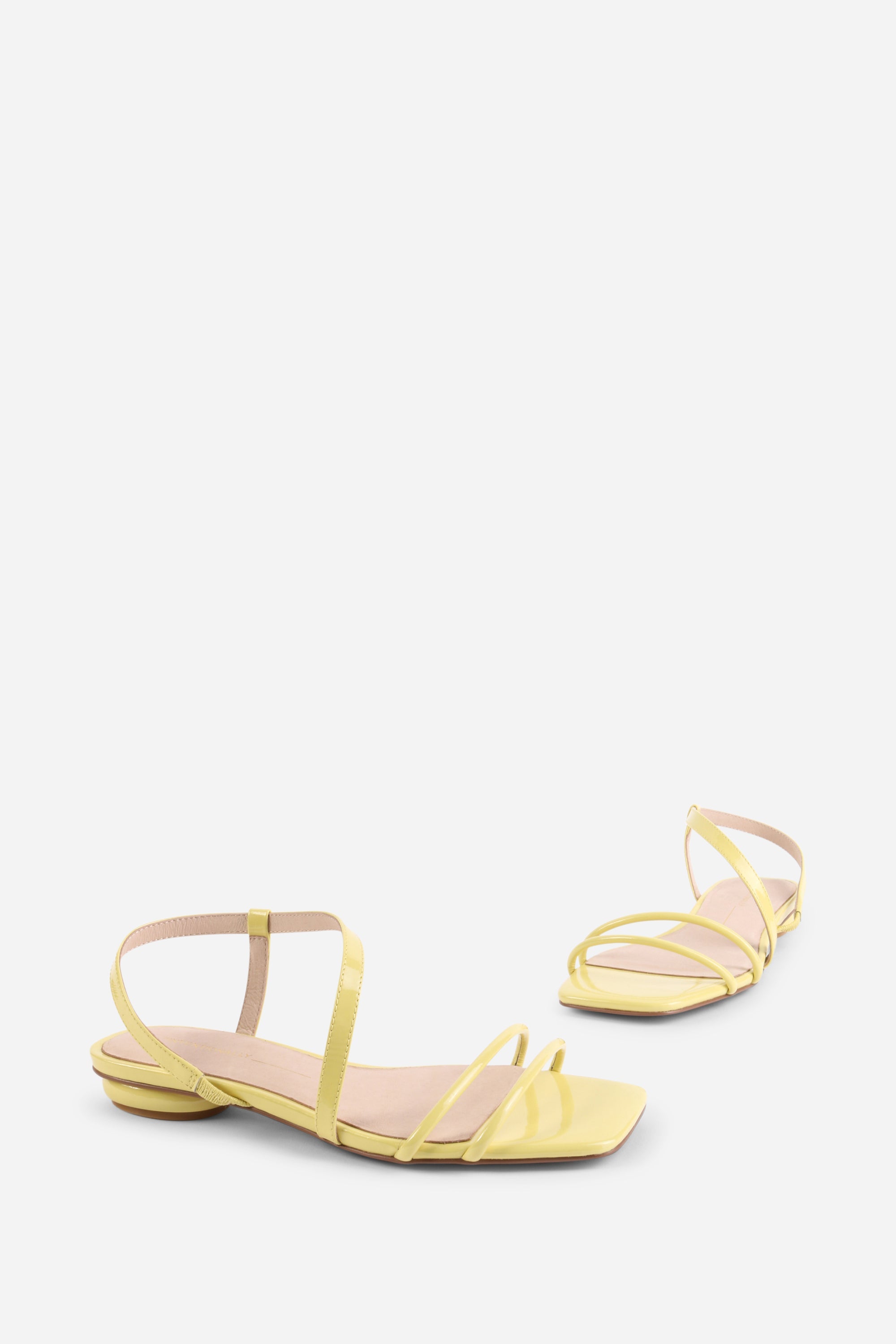 INTENTIONALLY __________. Nonfiction Flat Sandal