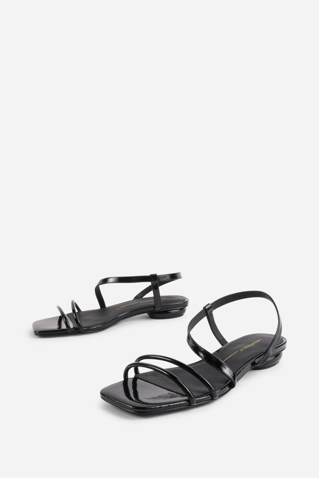 INTENTIONALLY __________. Nonfiction Flat Sandal