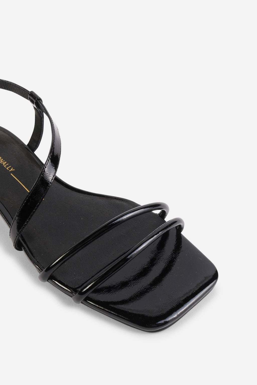 INTENTIONALLY __________. Nonfiction Flat Sandal