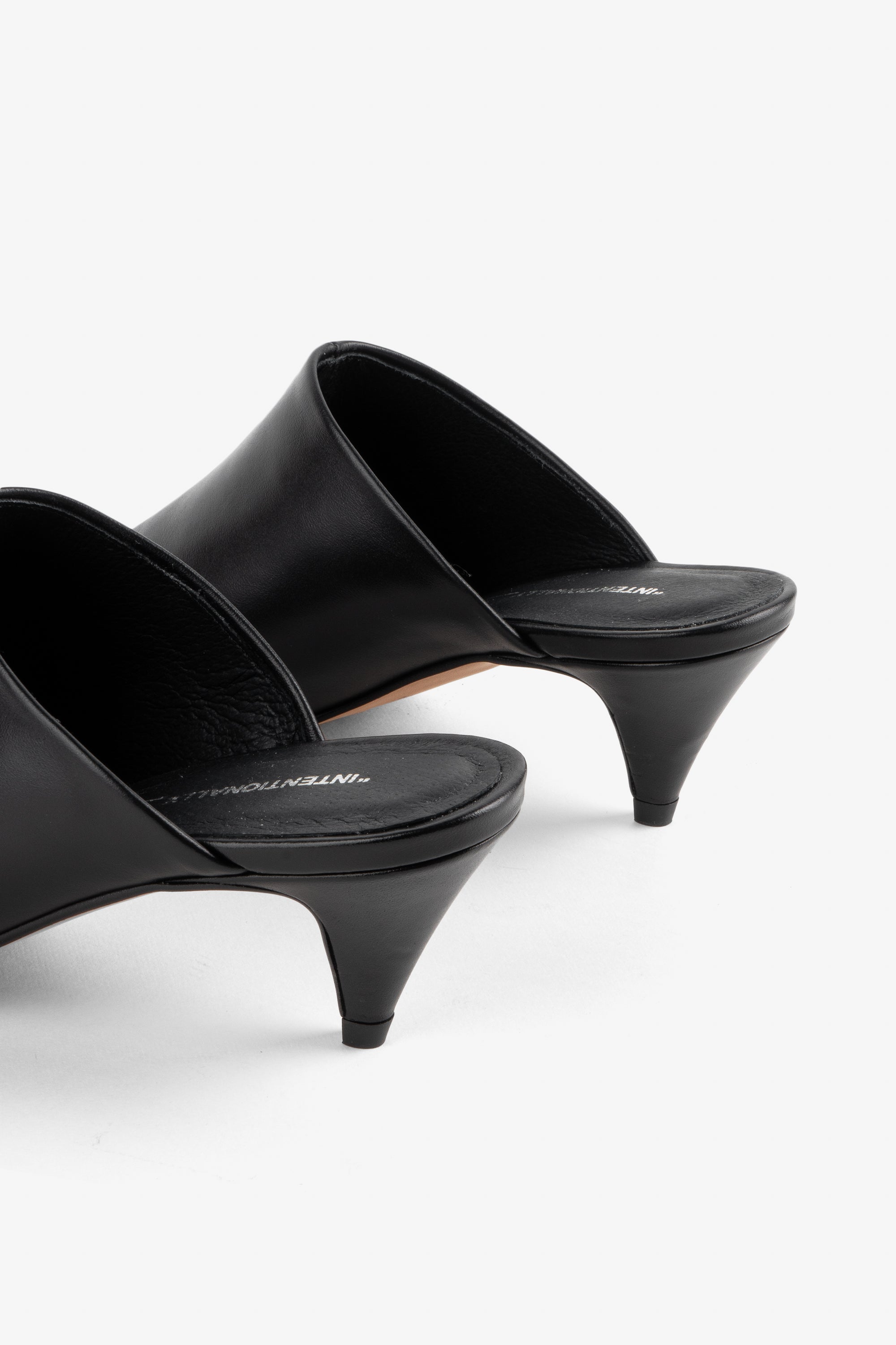 "INTENTIONALLY __________." Officially Heeled Mule