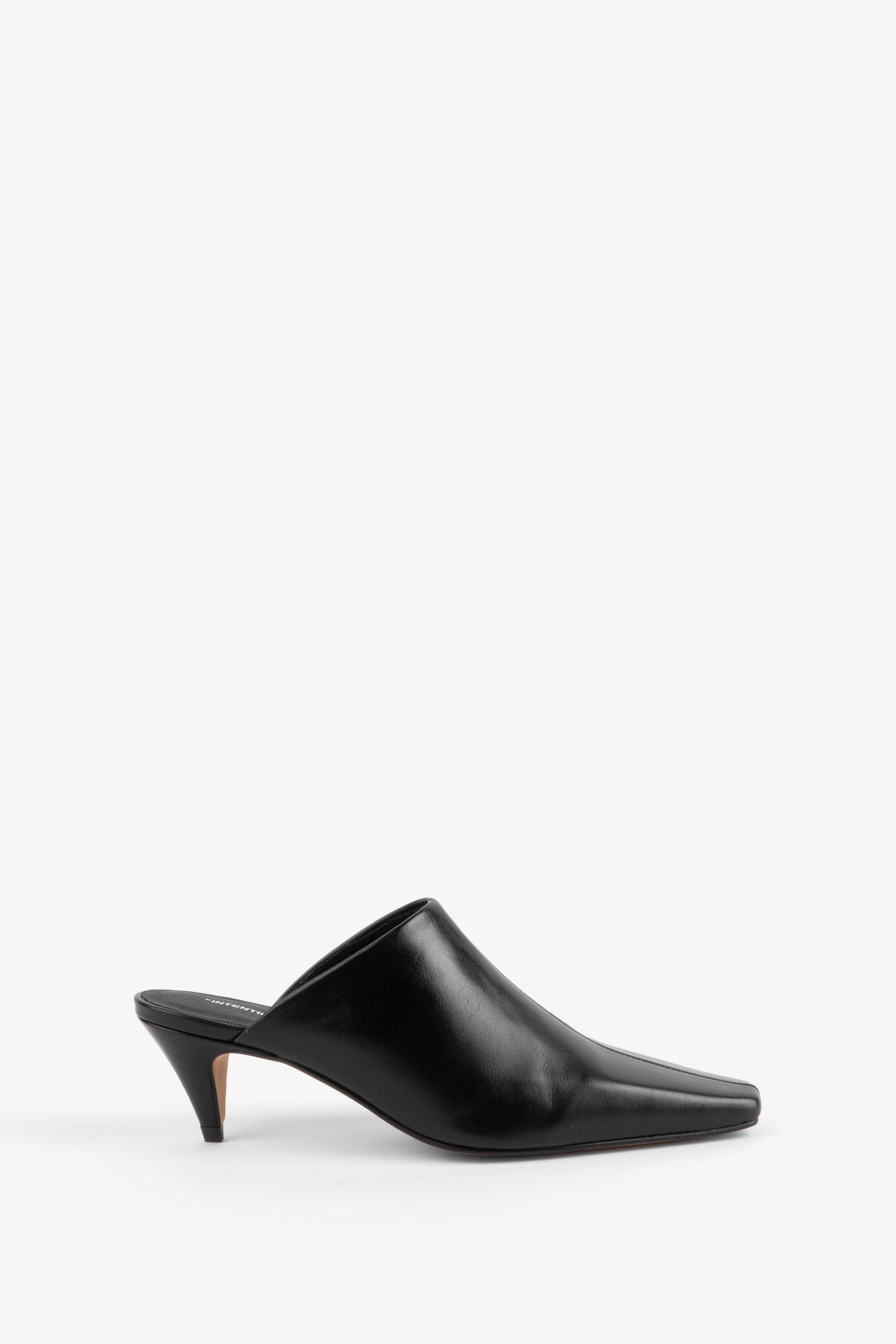 "INTENTIONALLY __________." Officially Heeled Mule