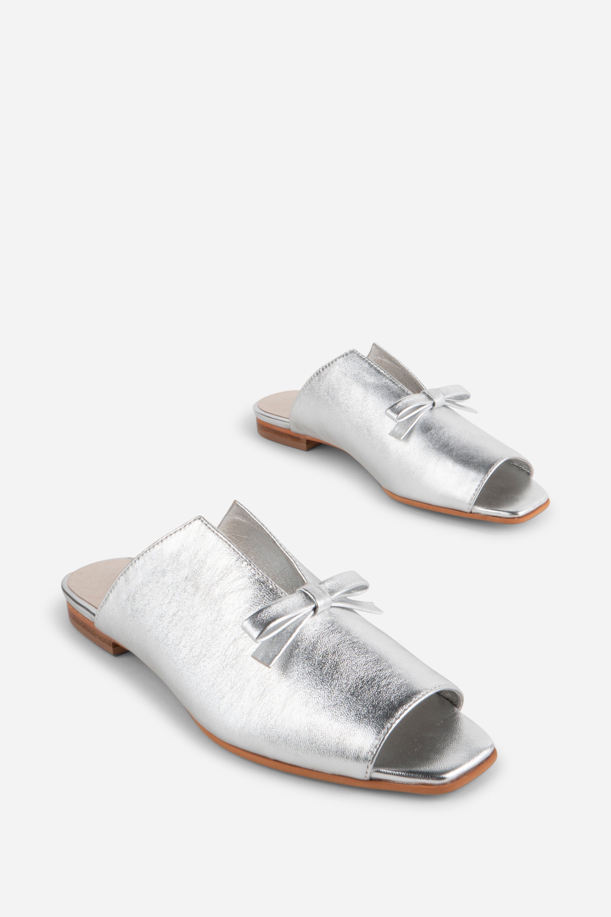"INTENTIONALLY __________." Palace Square Toe Flat - Mercury