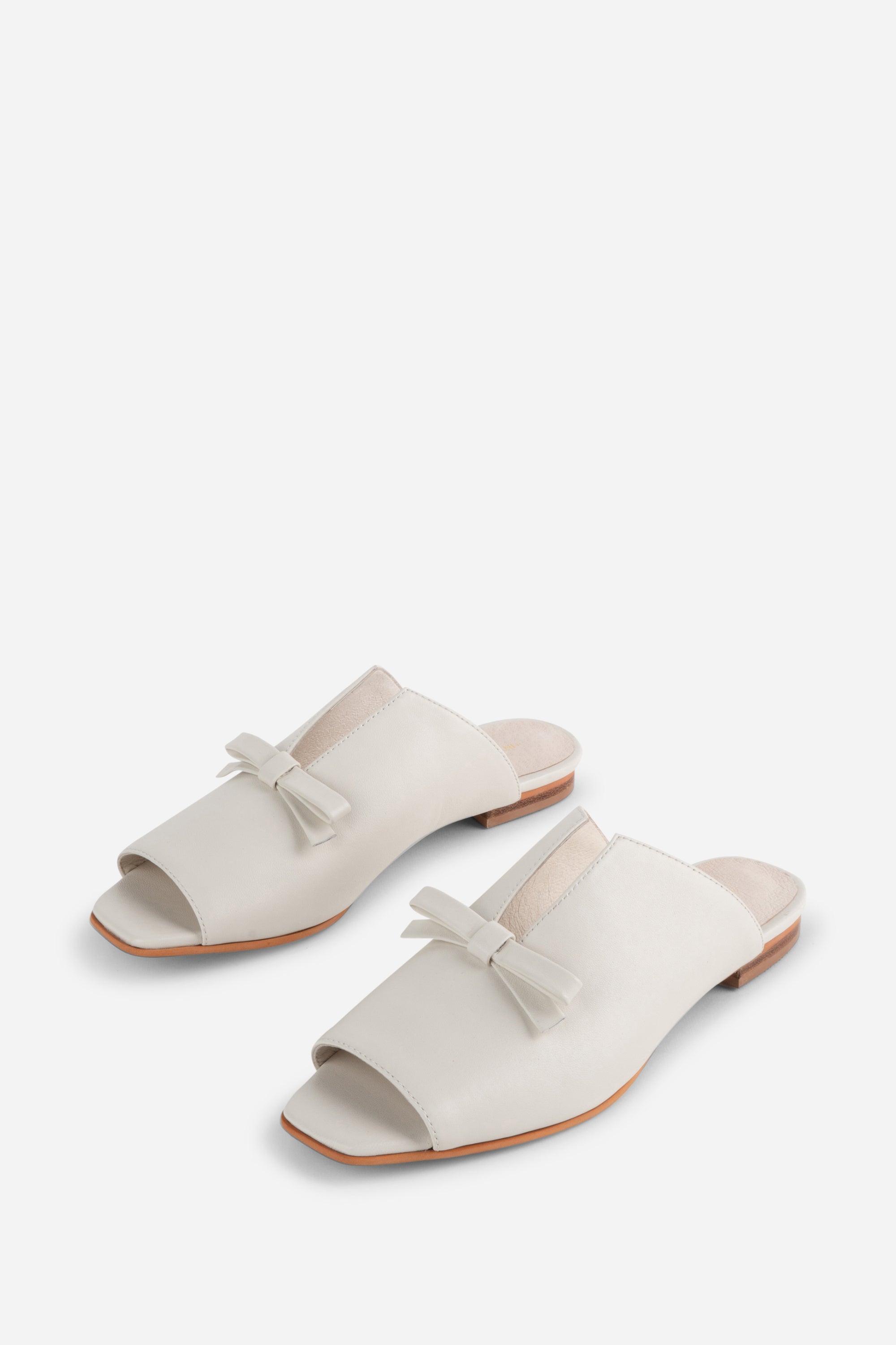 "INTENTIONALLY __________." Palace Square Toe Flat - Mercury