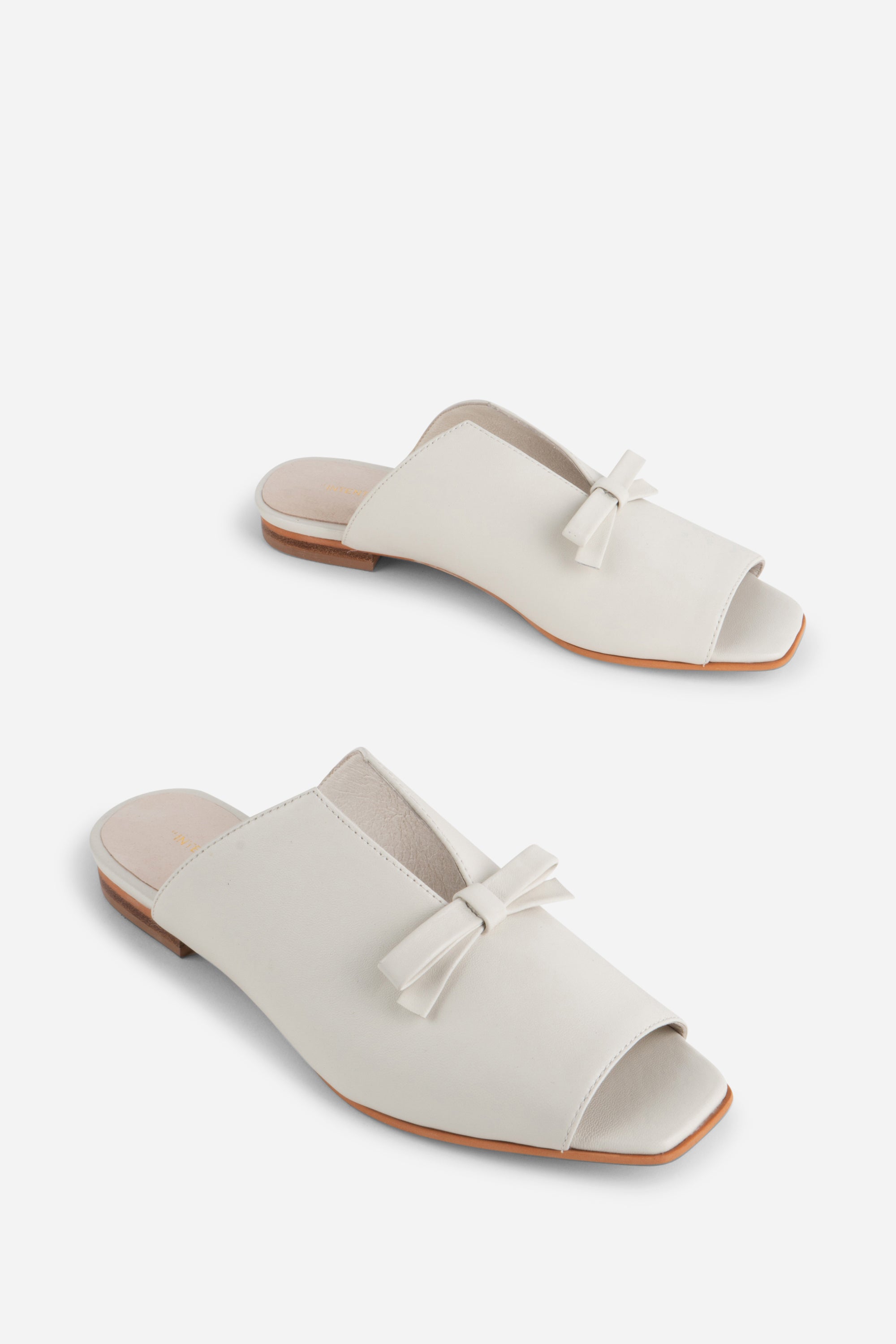 "INTENTIONALLY __________." Palace Square Toe Flat - Mercury