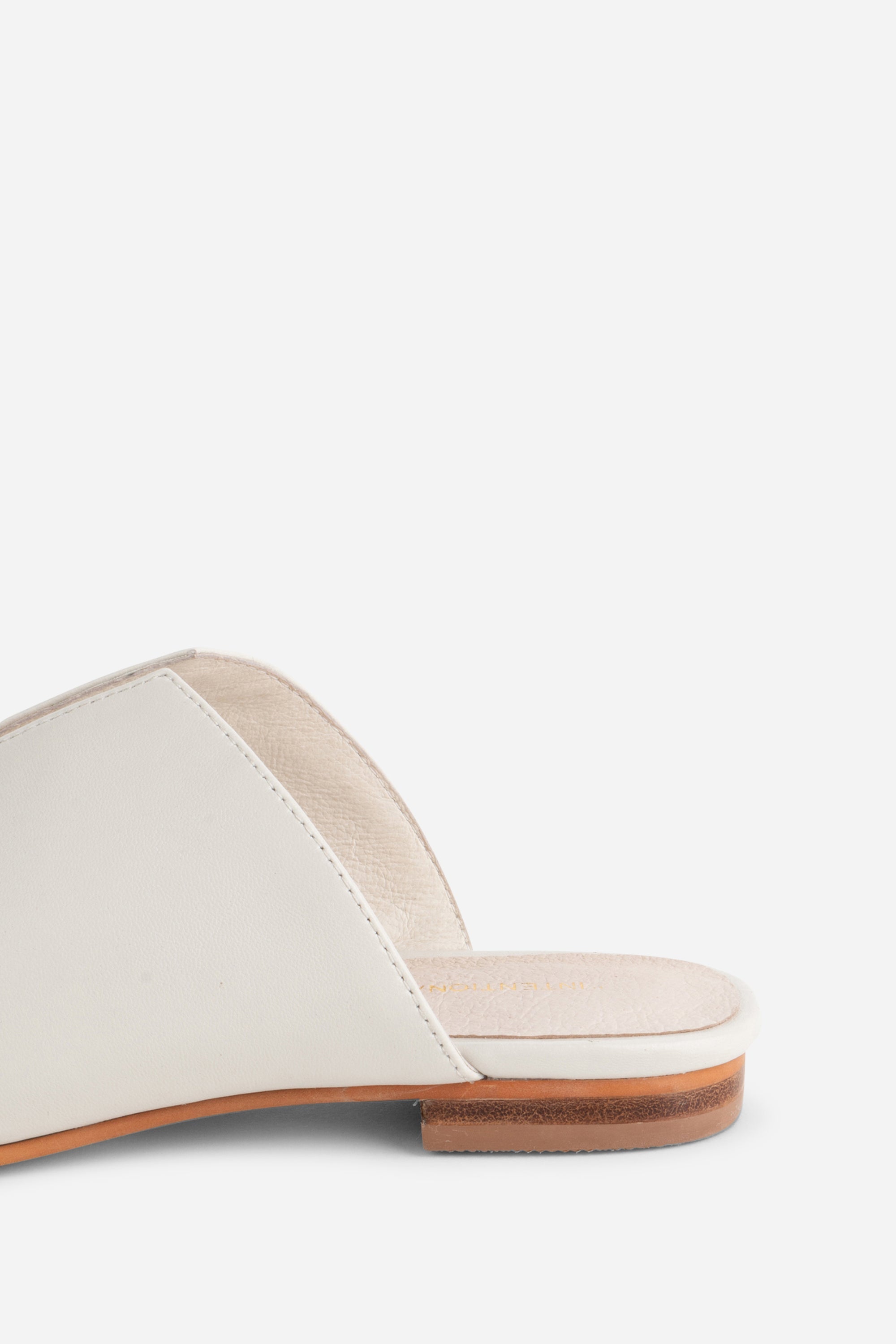 "INTENTIONALLY __________." Palace Square Toe Flat - Mercury