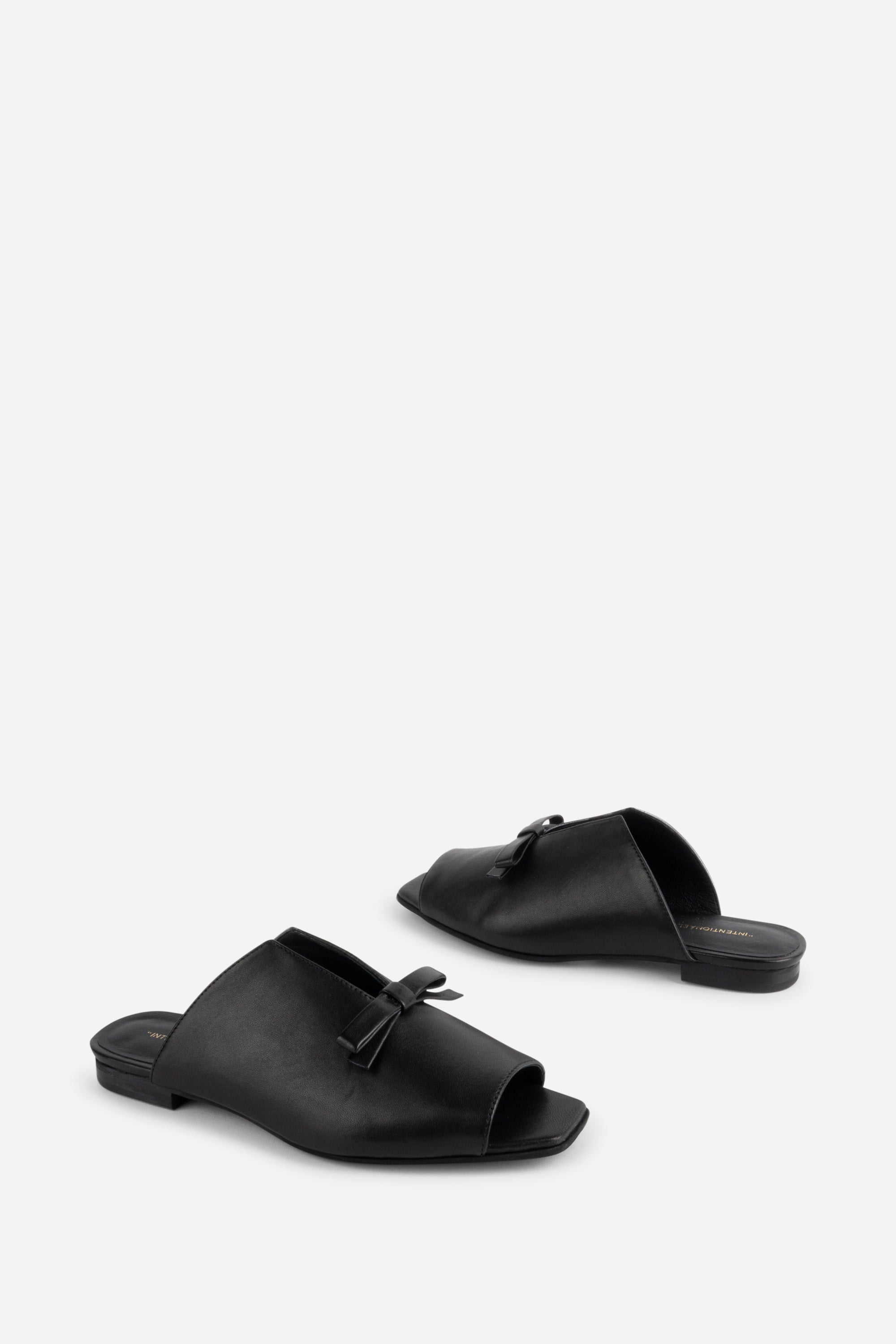 "INTENTIONALLY __________." Palace Square Toe Flat - Mercury