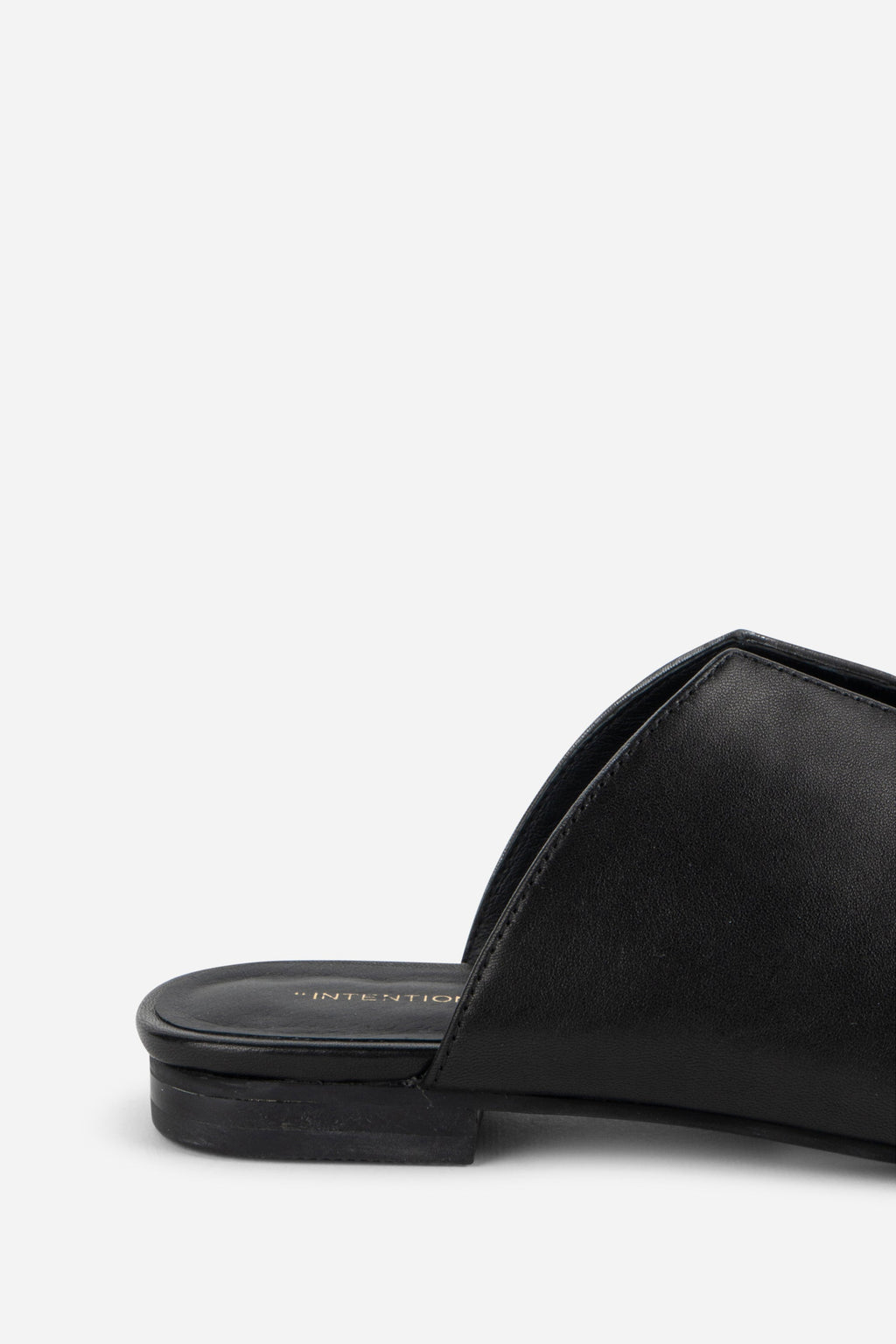 "INTENTIONALLY __________." Palace Square Toe Flat - Mercury