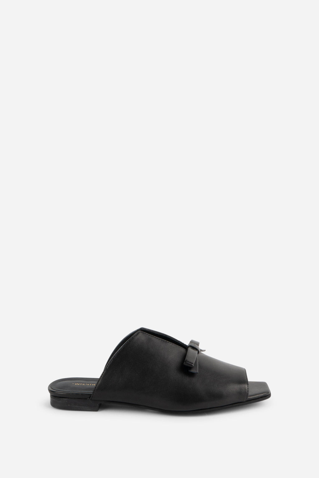 "INTENTIONALLY __________." Palace Square Toe Flat - Mercury