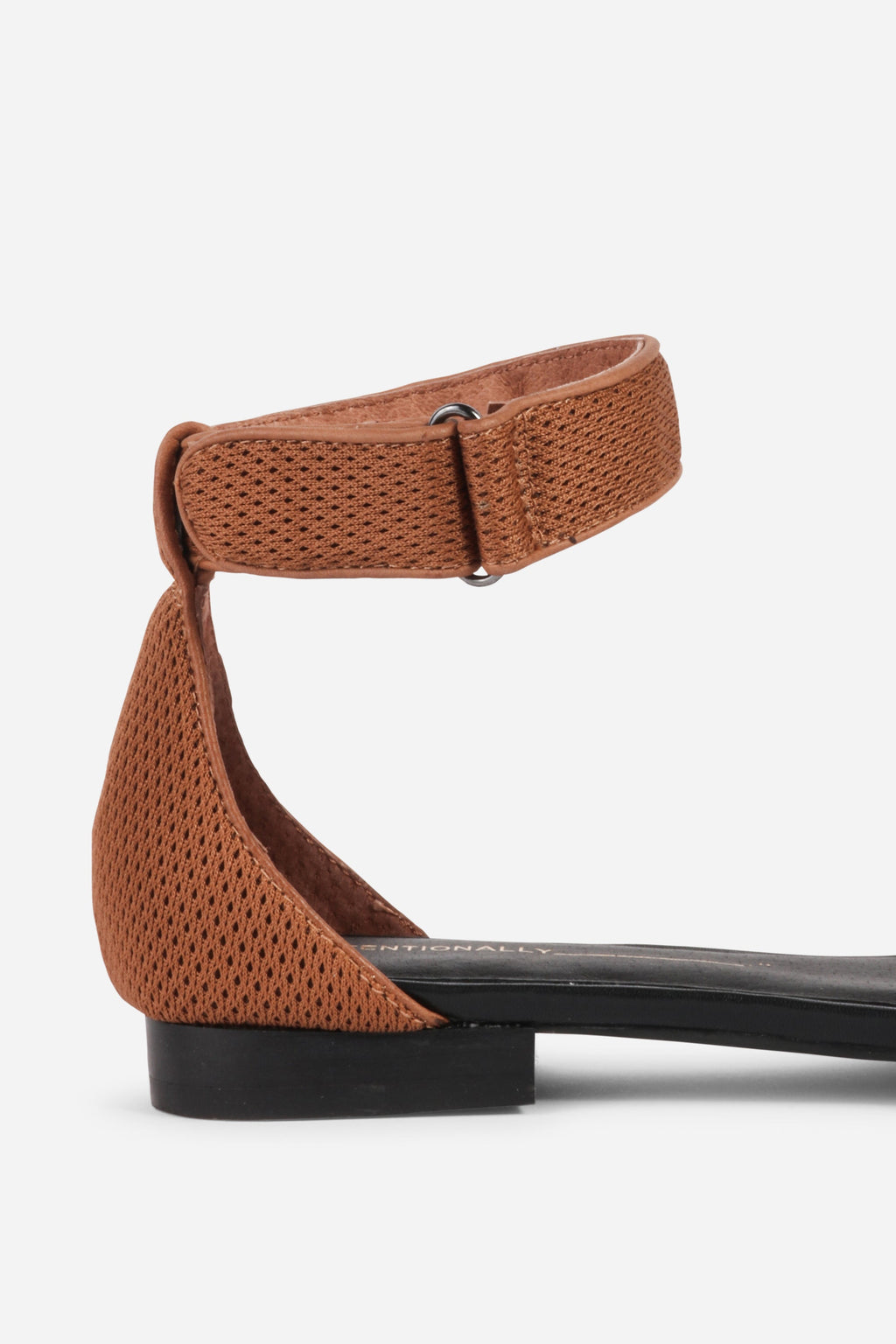 INTENTIONALLY __________. Potz Mesh Flat Sandal