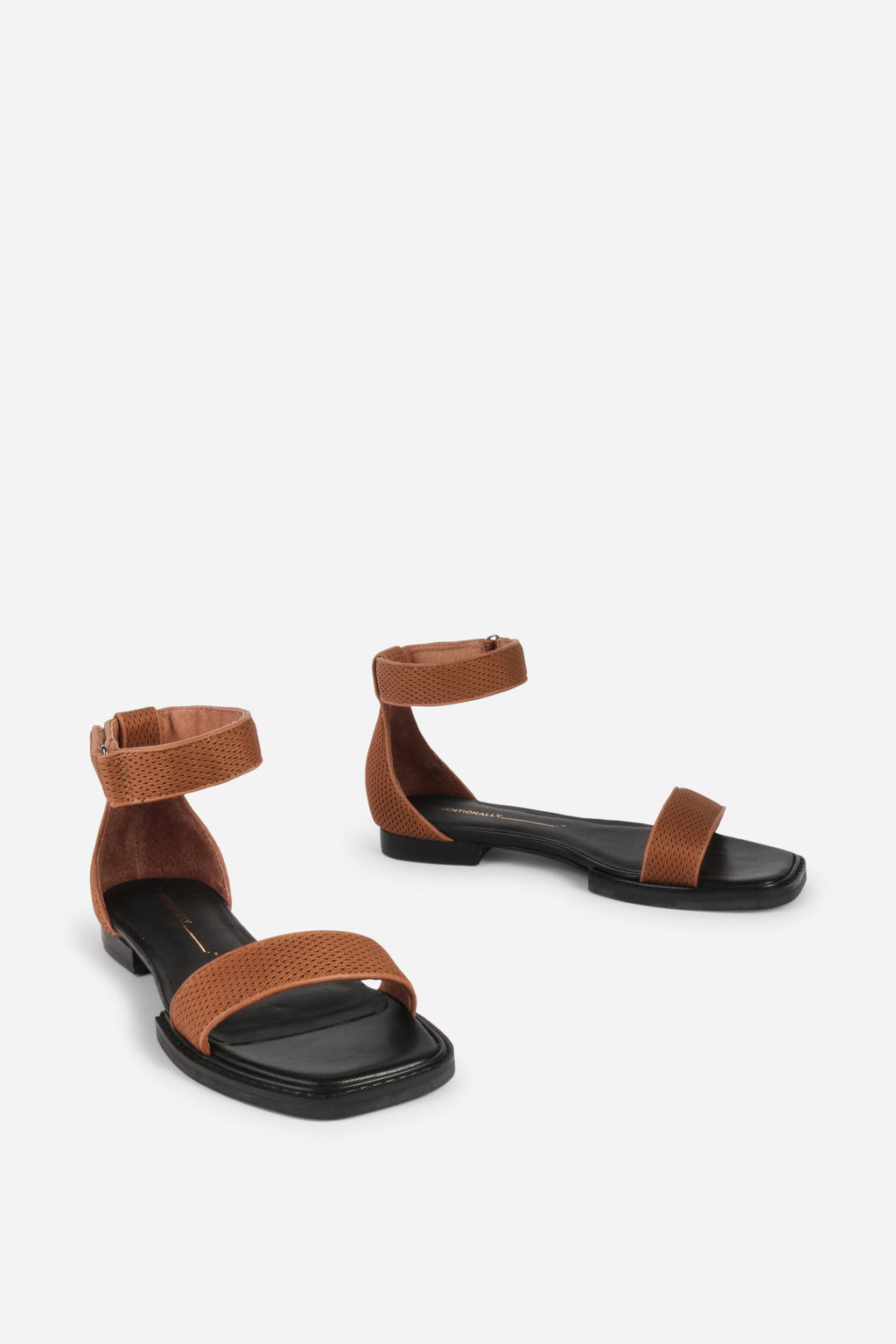 INTENTIONALLY __________. Potz Mesh Flat Sandal