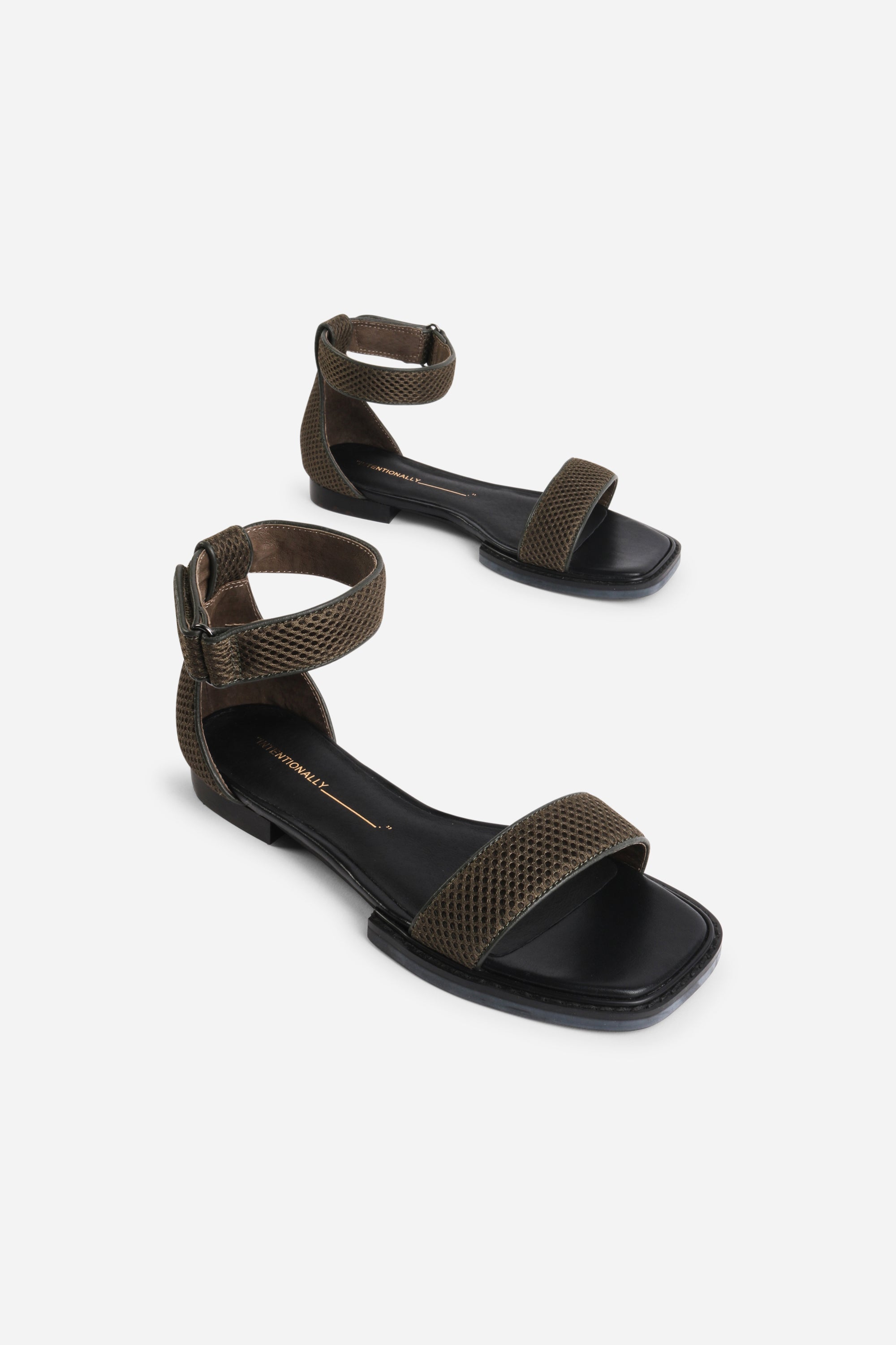 INTENTIONALLY __________. Potz Mesh Flat Sandal