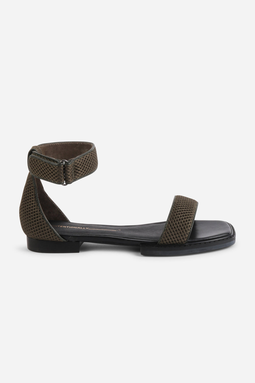 INTENTIONALLY __________. Potz Mesh Flat Sandal