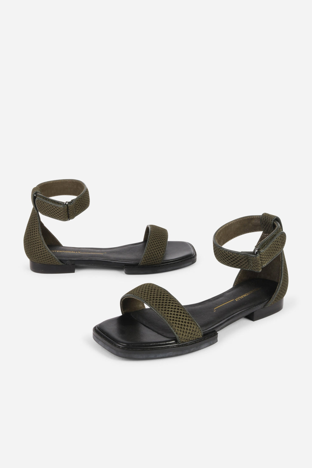 INTENTIONALLY __________. Potz Mesh Flat Sandal