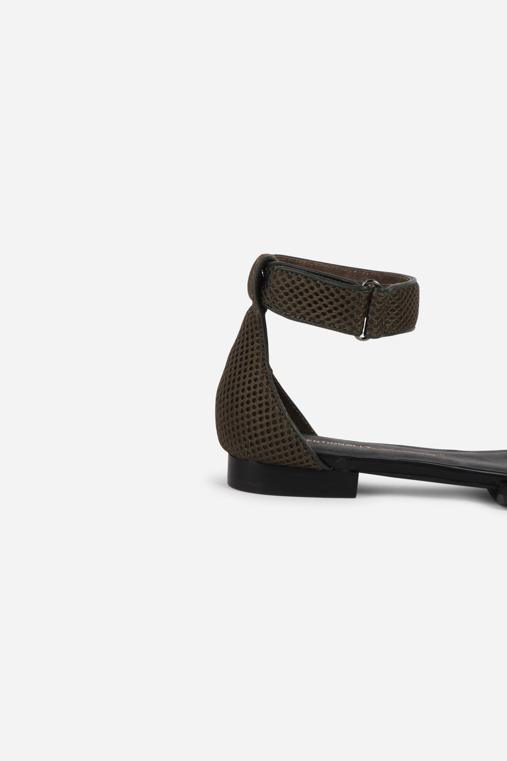 INTENTIONALLY __________. Potz Mesh Flat Sandal