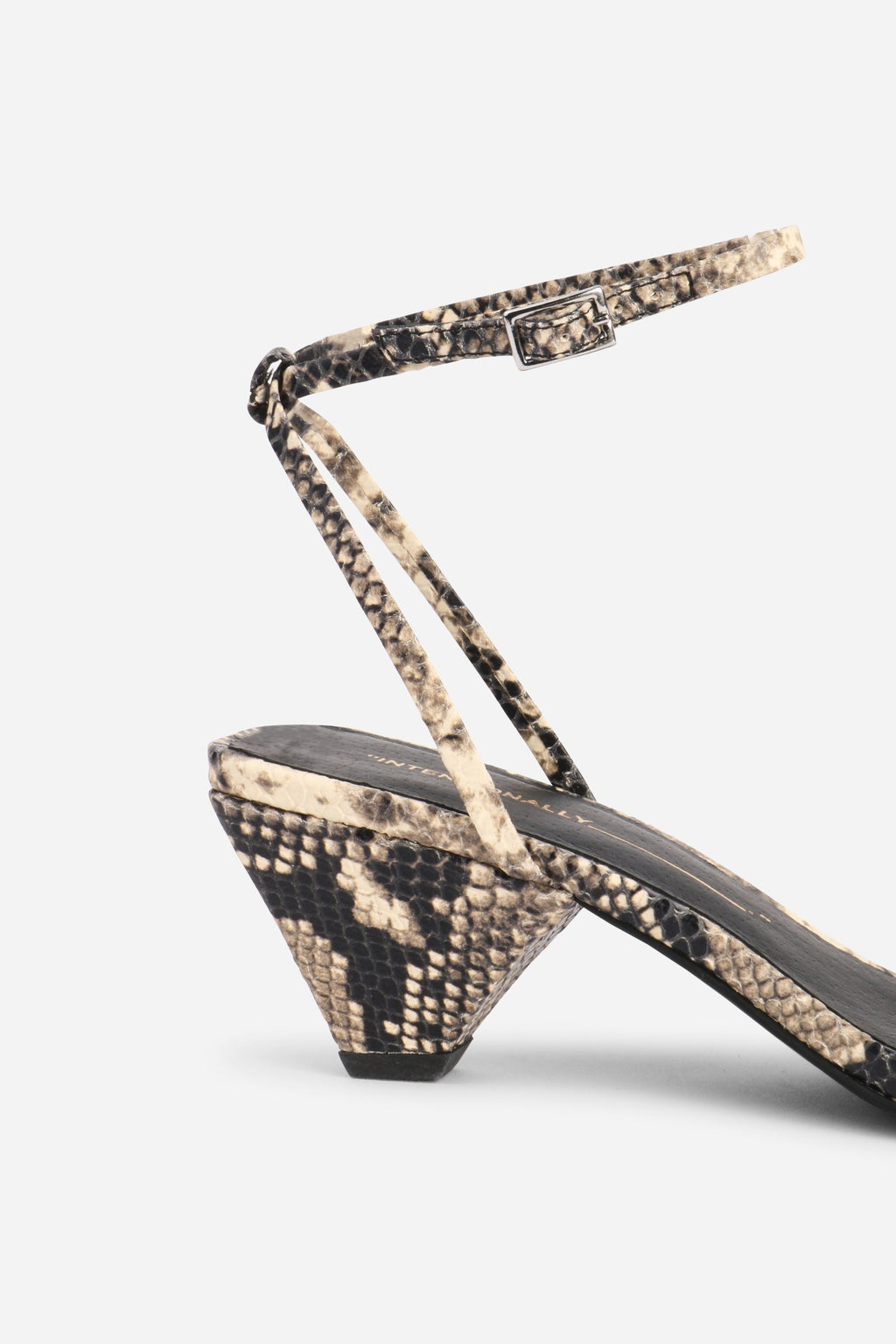 INTENTIONALLY __________. Pretty Please Snake Embossed Heel Sandal - Black White