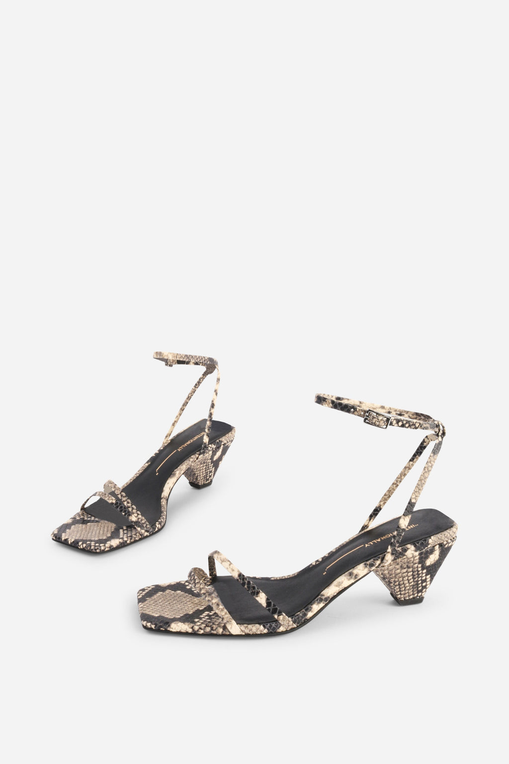 INTENTIONALLY __________. Pretty Please Snake Embossed Heel Sandal - Black White