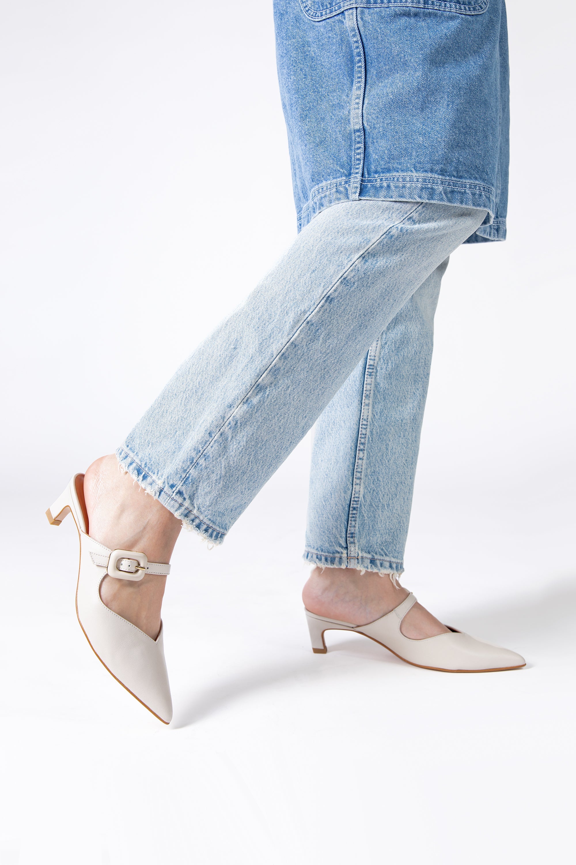 "INTENTIONALLY __________." Promo Mule Heel - Cream