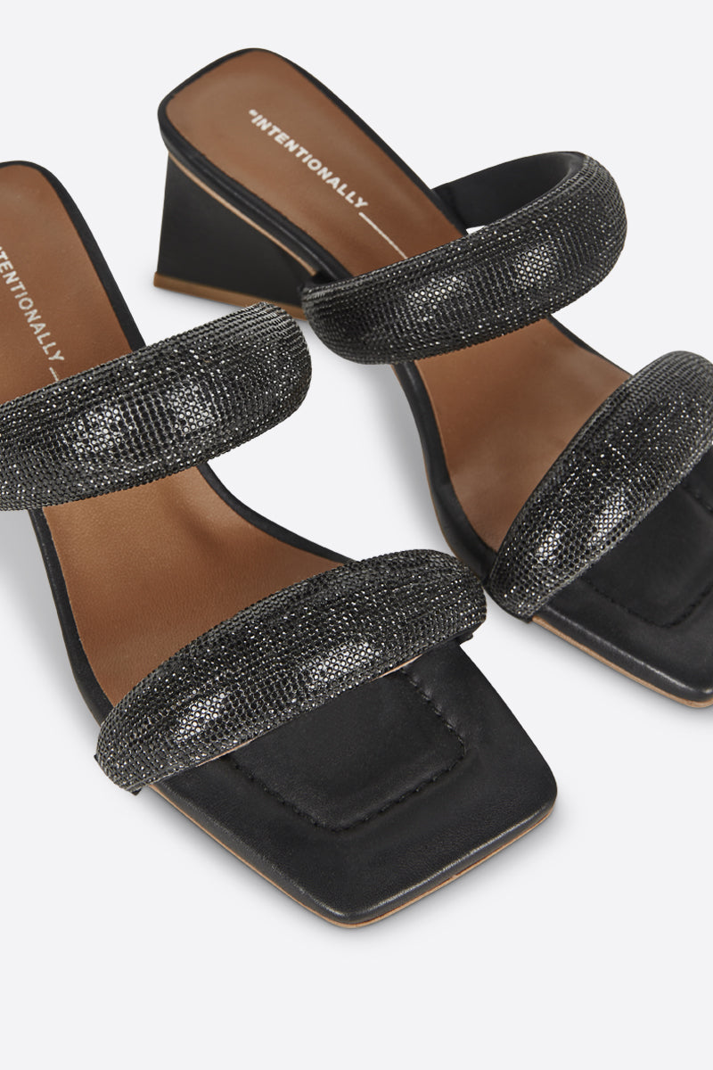 "INTENTIONALLY __________." RAZZLE HEELED SANDAL - Black
