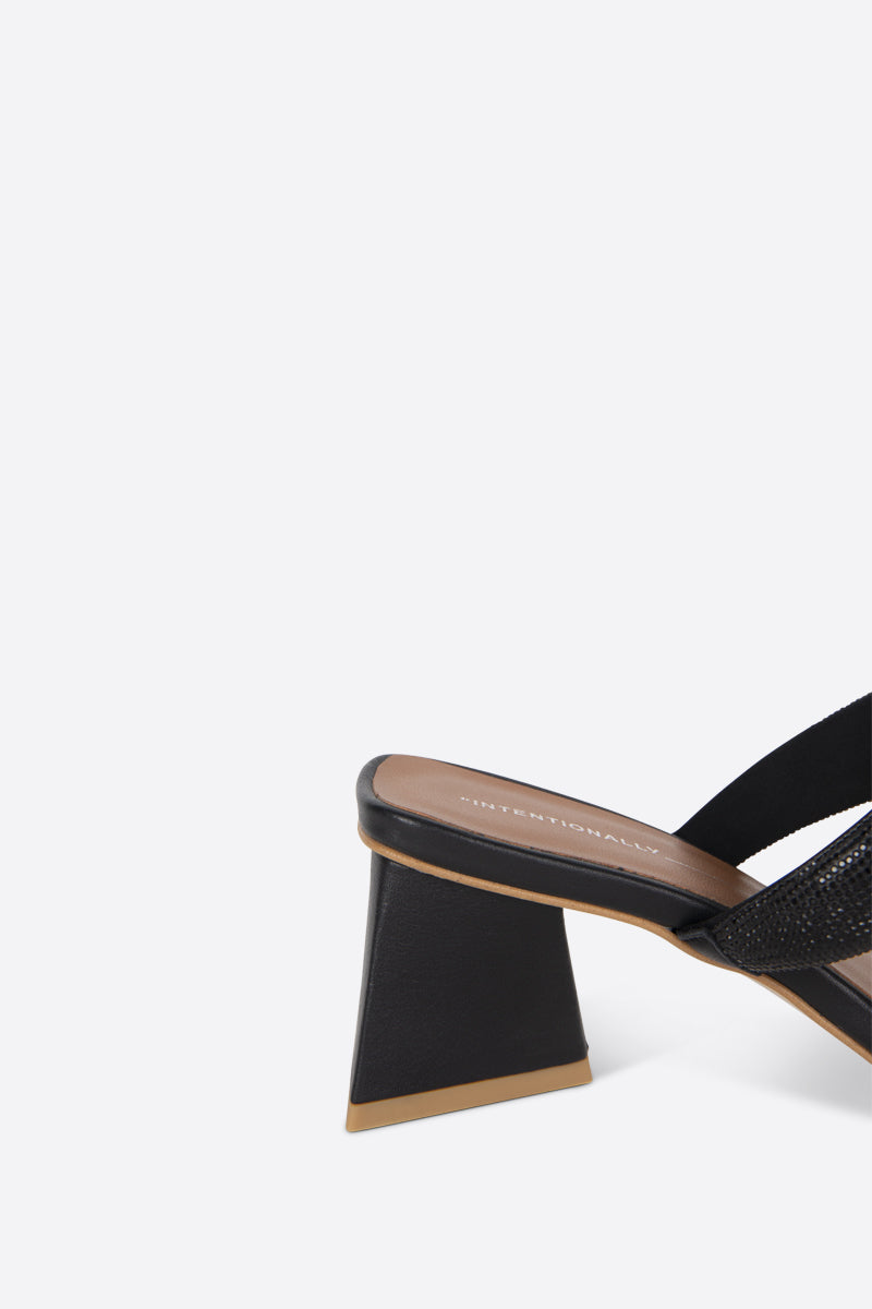 "INTENTIONALLY __________." RAZZLE HEELED SANDAL - Black