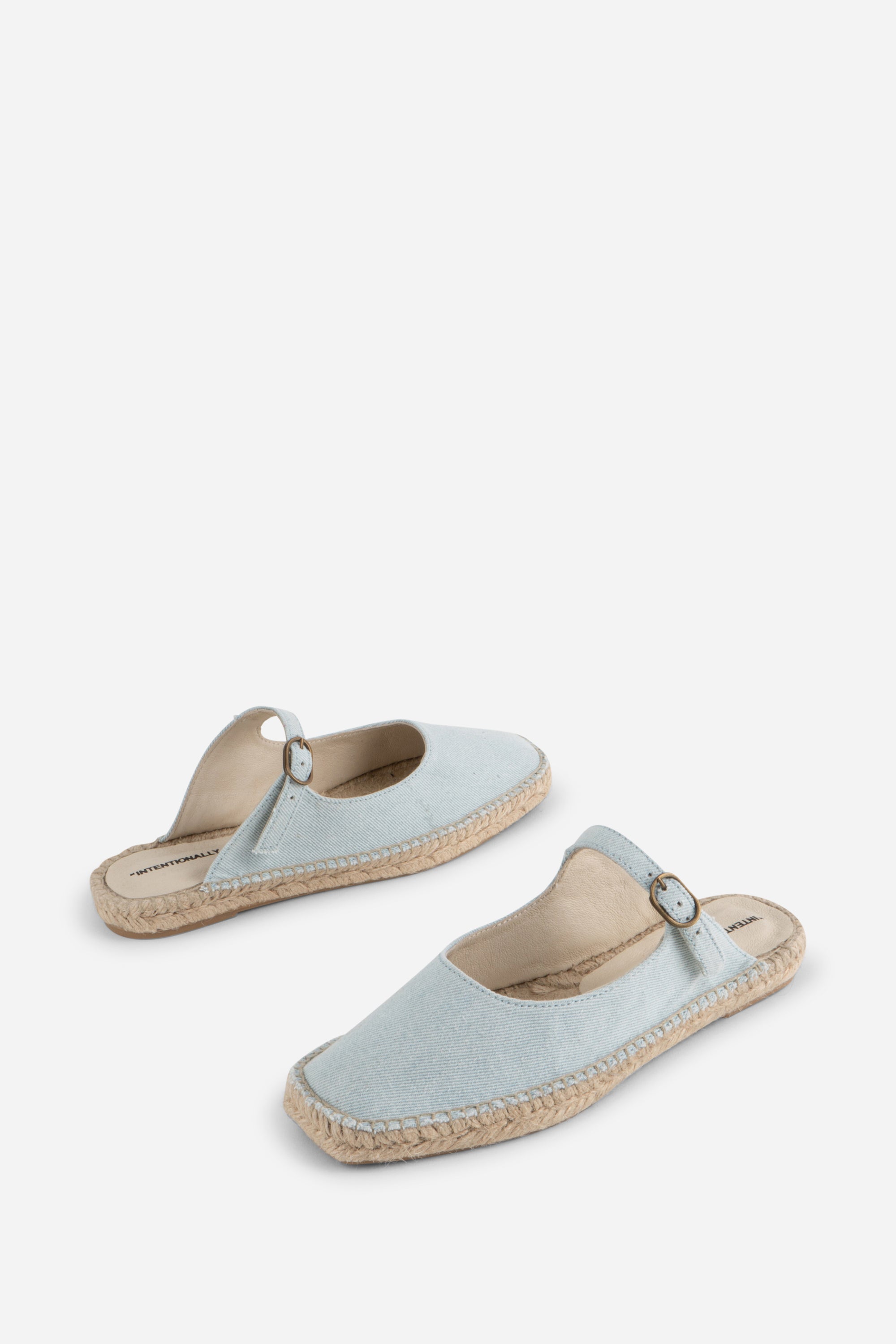 "INTENTIONALLY __________." Reports Denim Slip On Espadrille - Light Blue