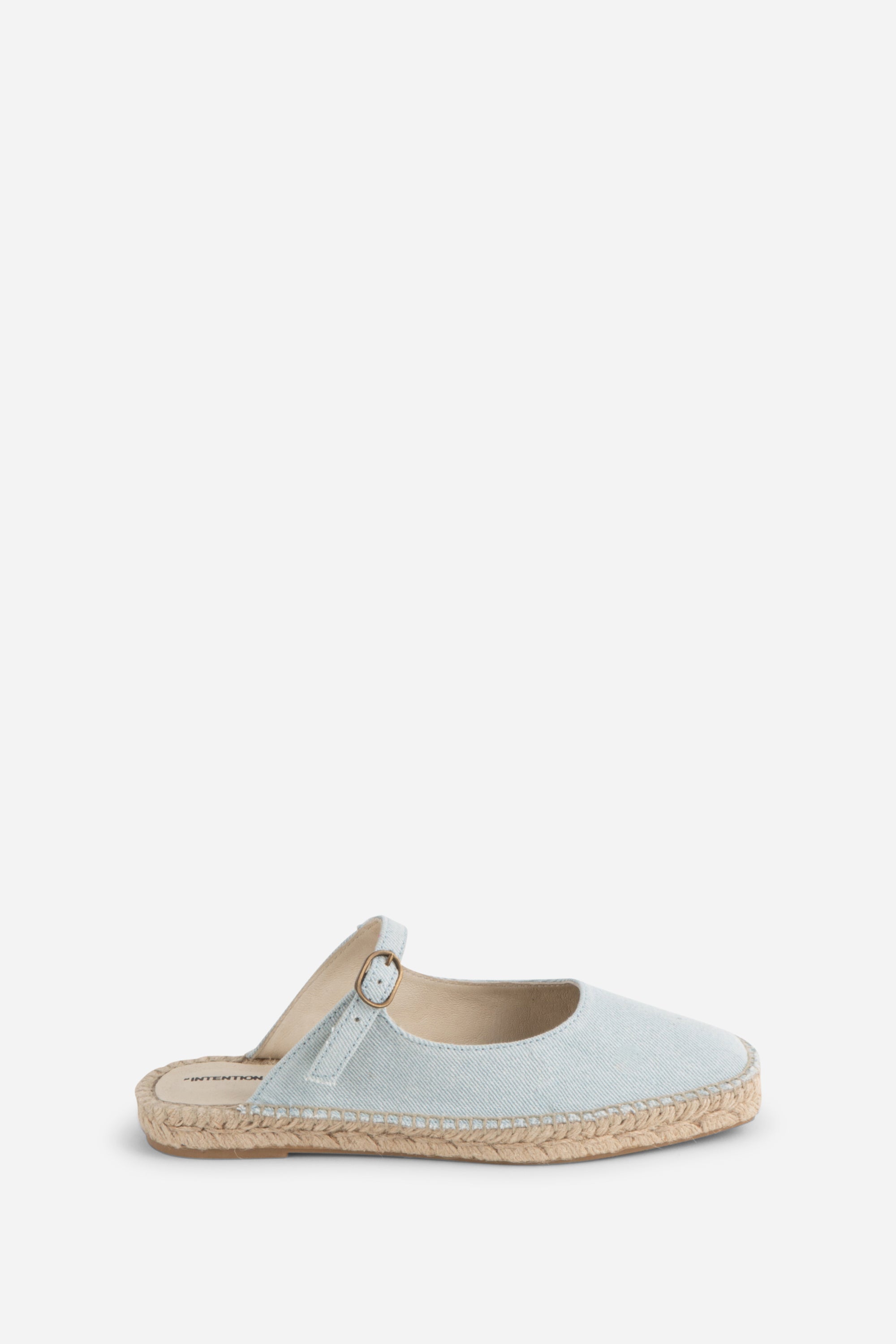 "INTENTIONALLY __________." Reports Denim Slip On Espadrille - Light Blue