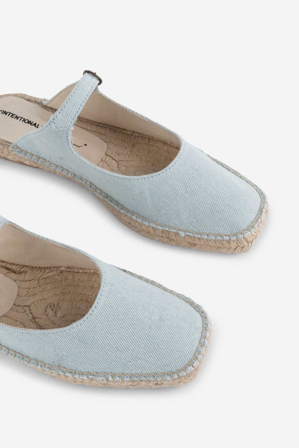 "INTENTIONALLY __________." Reports Denim Slip On Espadrille - Light Blue